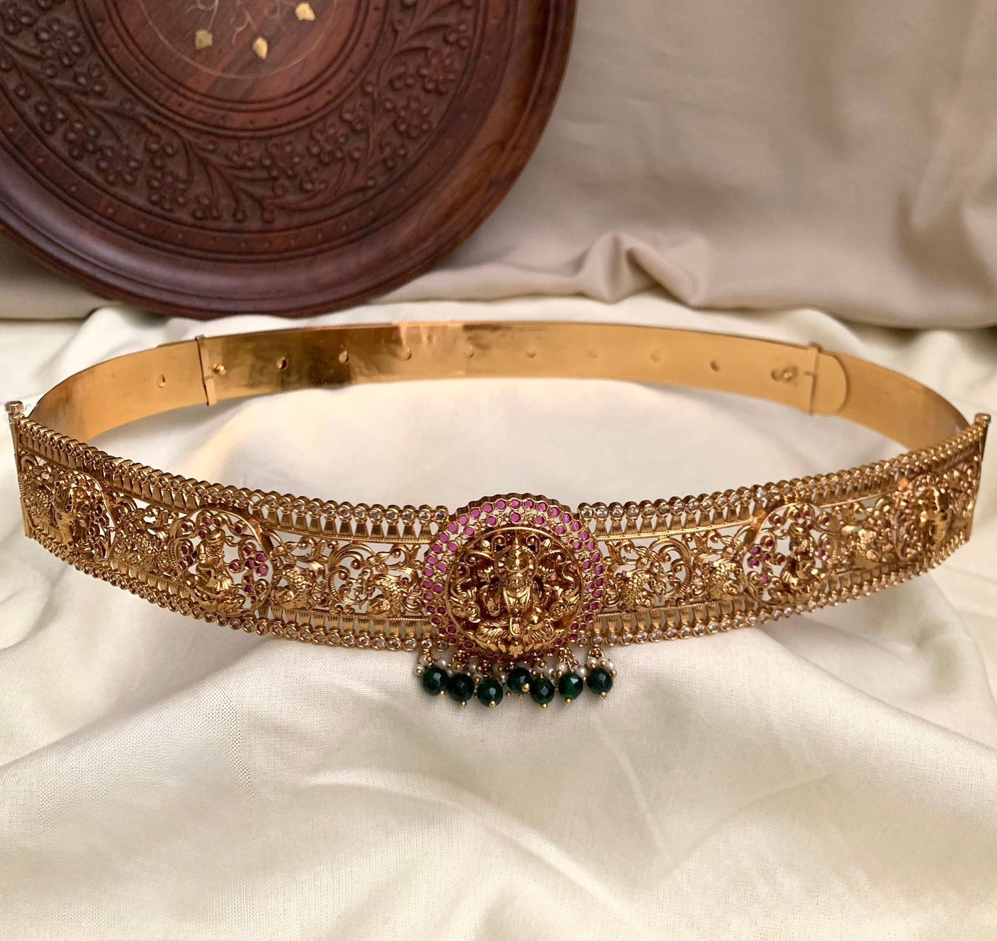 GOLD FINISH WAIST BELT WITH LAKSHMI PENDANT & GREEN BEADS