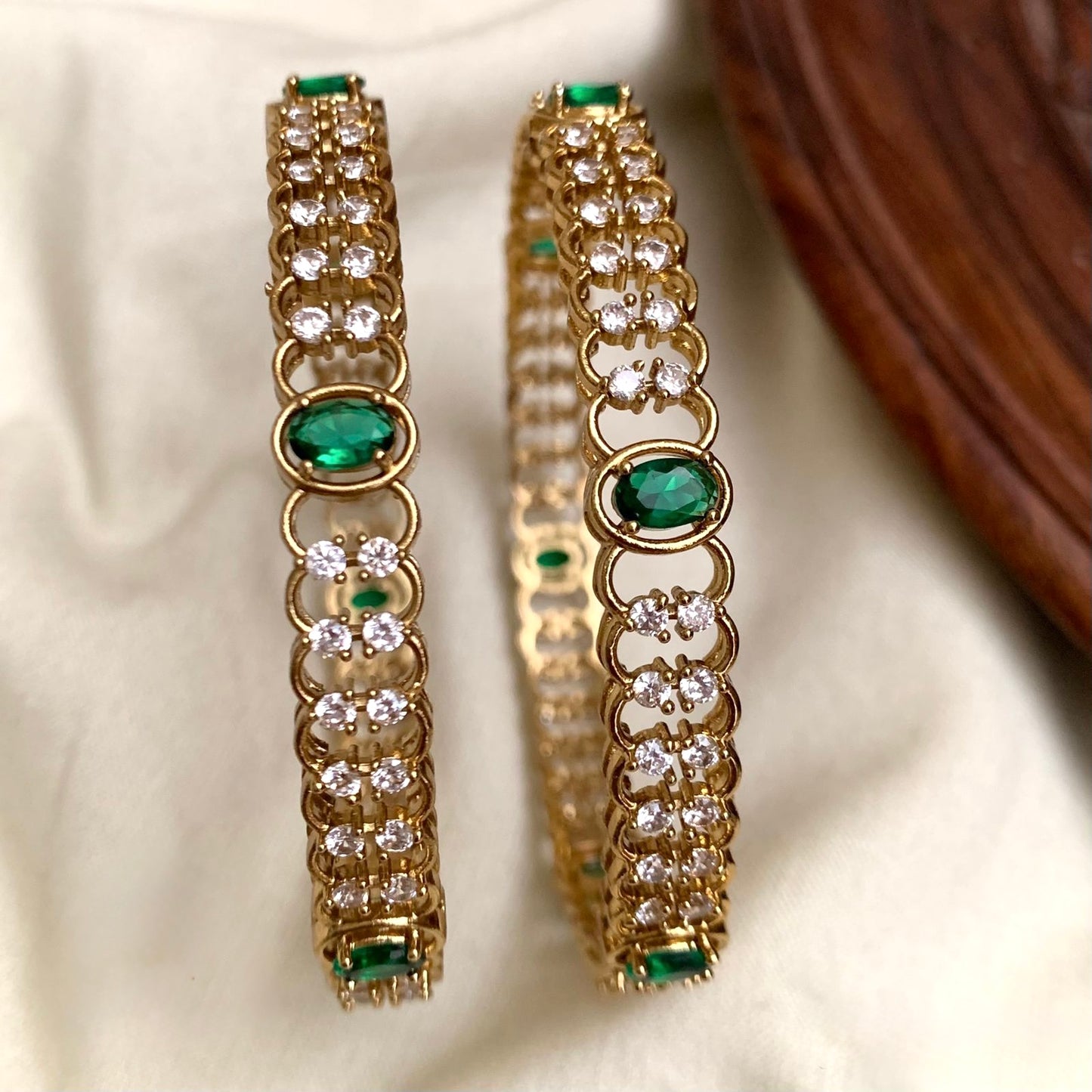 GOLD FINISH DESIGNER BANGLE WITH CZ GREEN STONE
