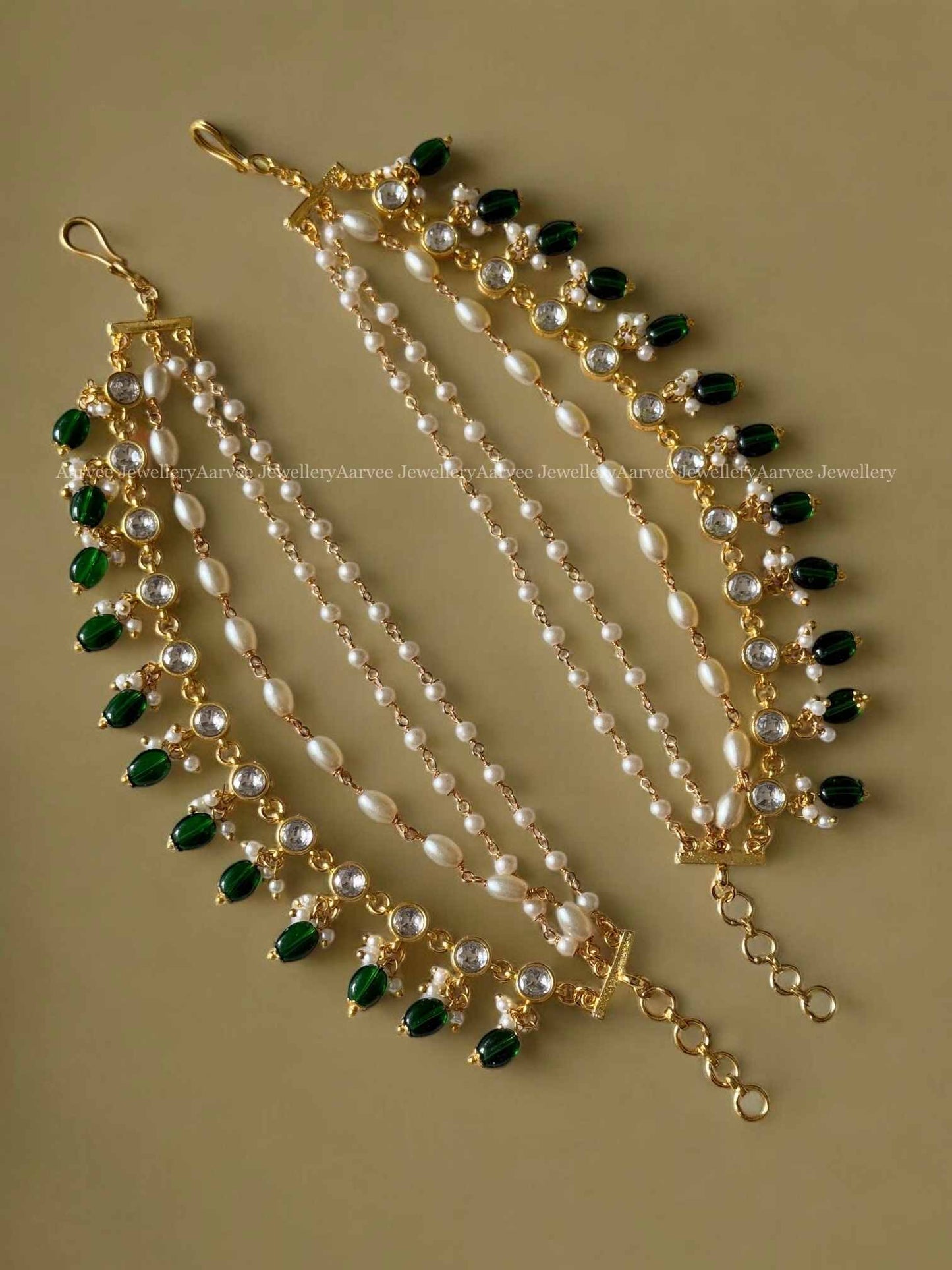 JADAU LAYERED EAR CHAIN WITH WHITE KUNDAN STONES AND GREEN BEADS