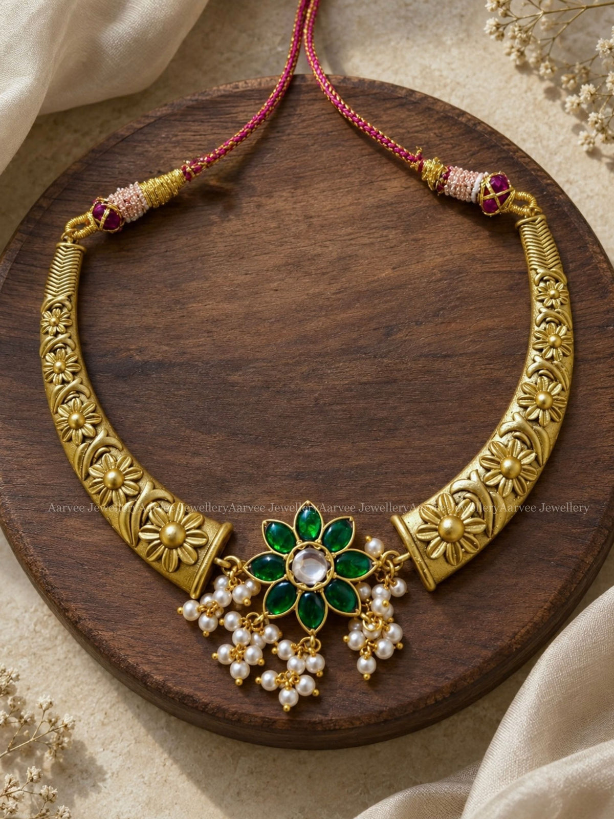 JADAU KUNDAN GOLD TONE KANTI NECKLACE WITH GREEN STONE FLORAL PENDANT