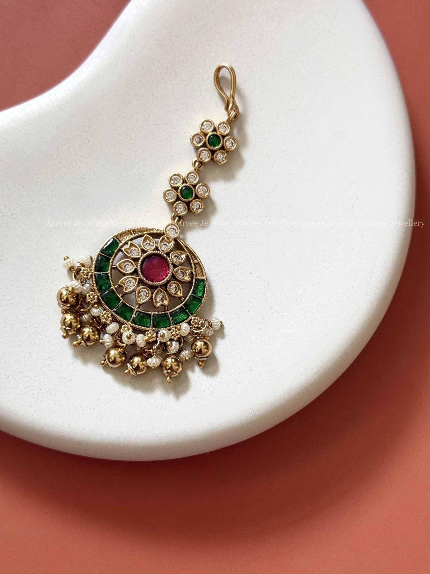 KEMP FLORAL TIKKA WITH RUBY / GREEN STONES AND GOLD BEADS
