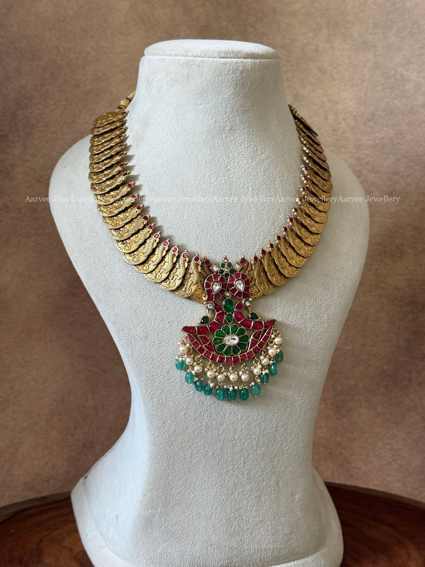 JADAU KUNDAN COIN NECKLACE WITH PEACOCK PENDANT IN PASTEL BEADS
