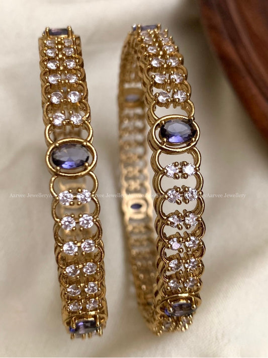GOLD TONE DESIGNER BANGLE WITH PURPLE STONE