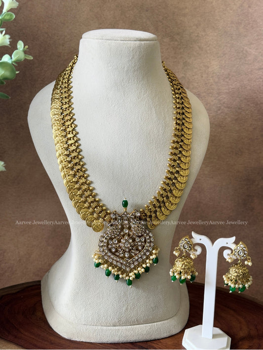 COIN MIDLENGTH CHAIN WITH JADAU KUNDAN WHITE STONE PEACOCK PENDANT & JHUMKI IN GREEN BEADS