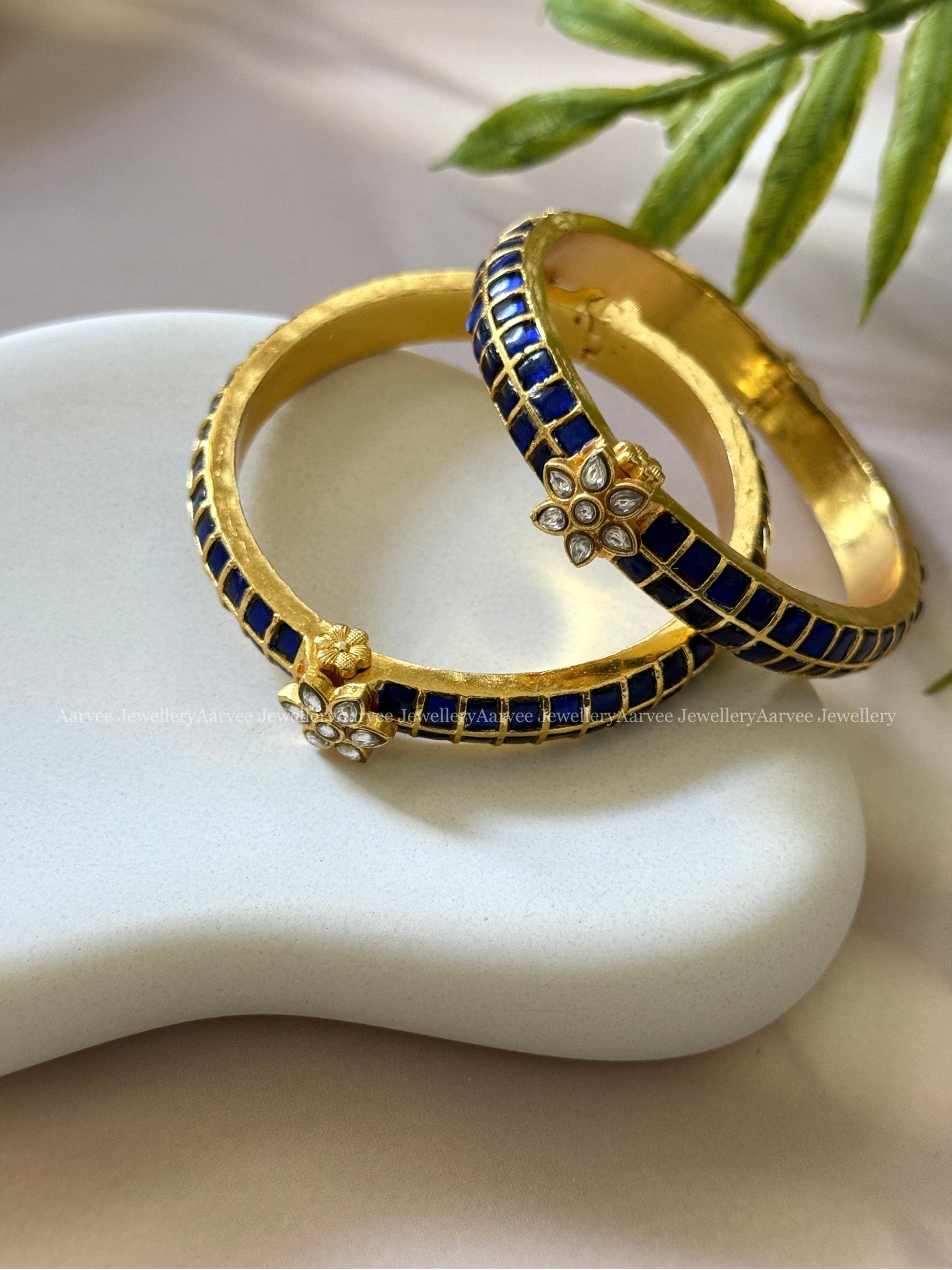 JADAU KUNDAN FLORAL KADA BANGLE WITH BLUE/WHITE STONES