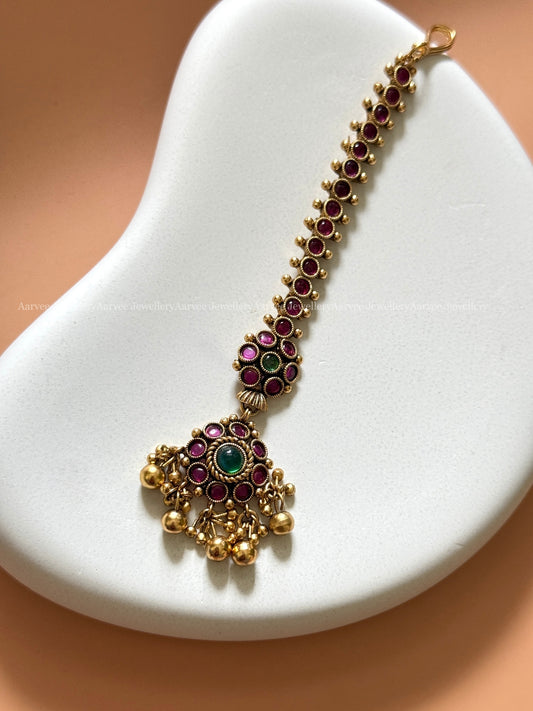 KEMP DEEP RUBY / GREEN STONE FLORAL TIKKA WITH GOLD BEADS