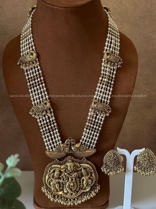 PEARL BEADED HARAM SET WITH A BOLD RADHEY KRISHNA PENDANT