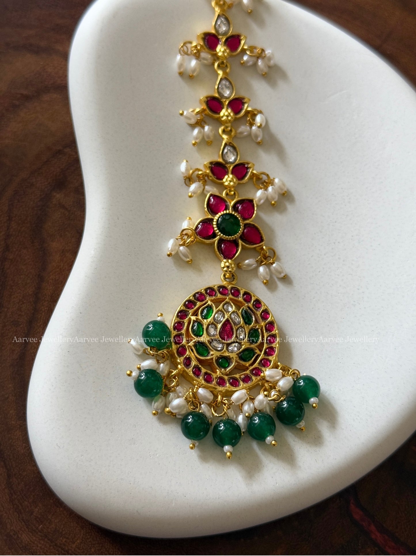 JADAU KUNDAN LOTUS TIKKA WITH GREEN BEADS