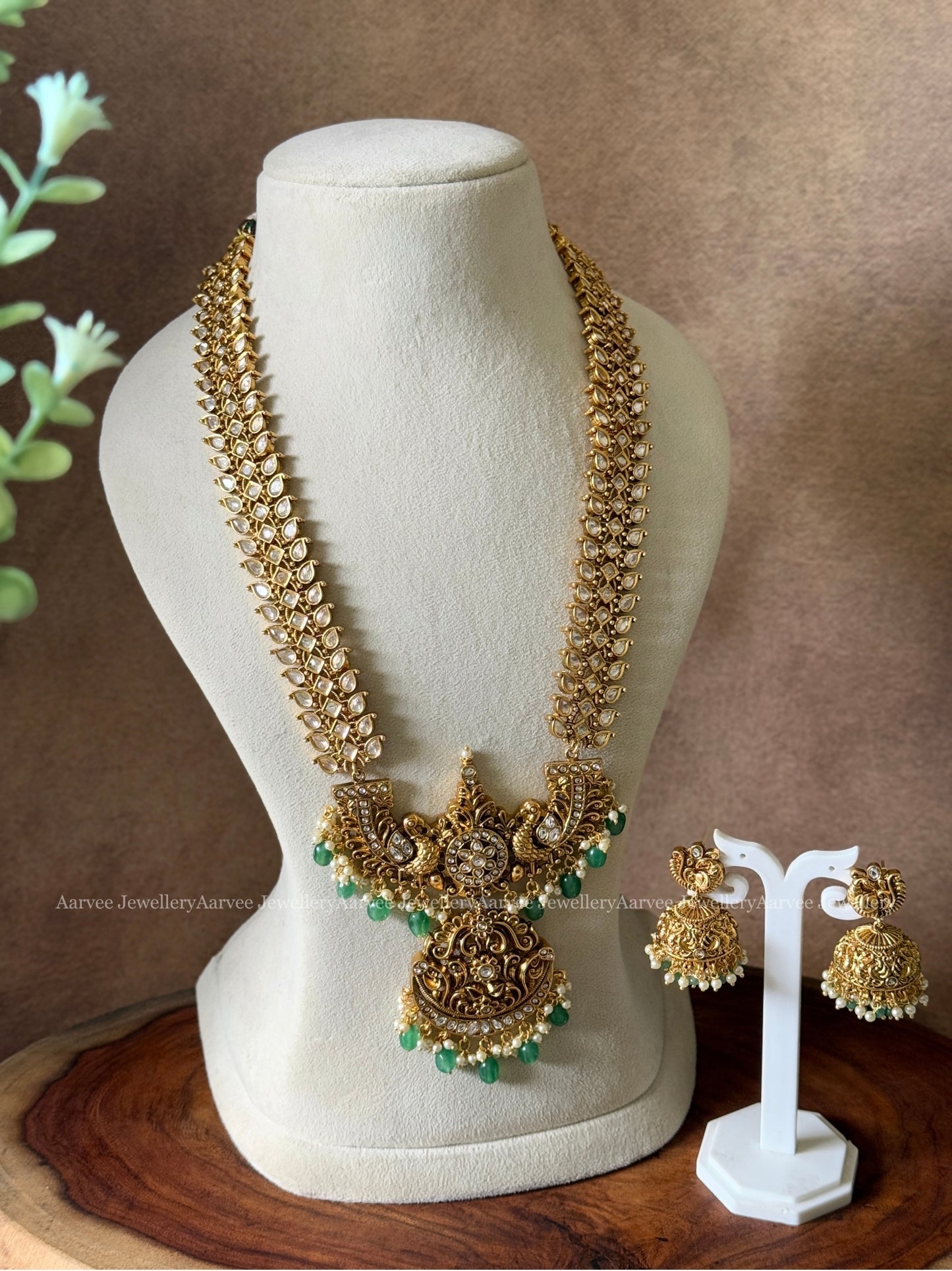 LEGANT WHITE STONE KUNDAN HARAM SET ADORNED WITH PASTEL BEADS
