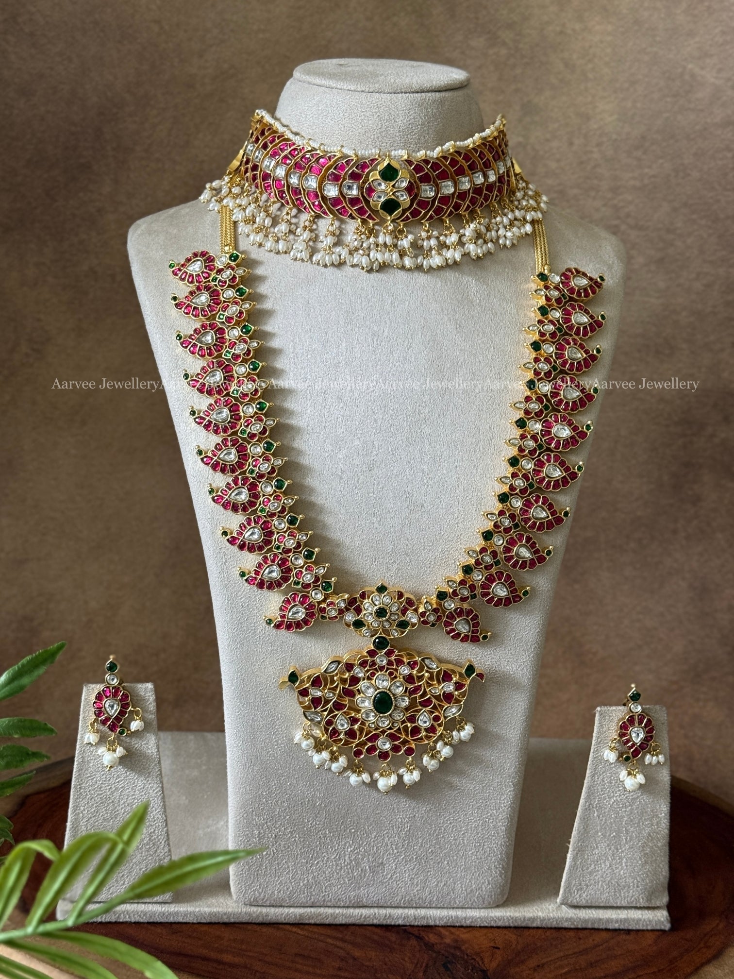 JADAU KUNDAN SEMI BRIDAL JEWELLERY SET RUBY STONE - CRESCENT CHOKER WITH MID LENGTH MANGO MOTIF HARAM SET WITH PEARL BEADS