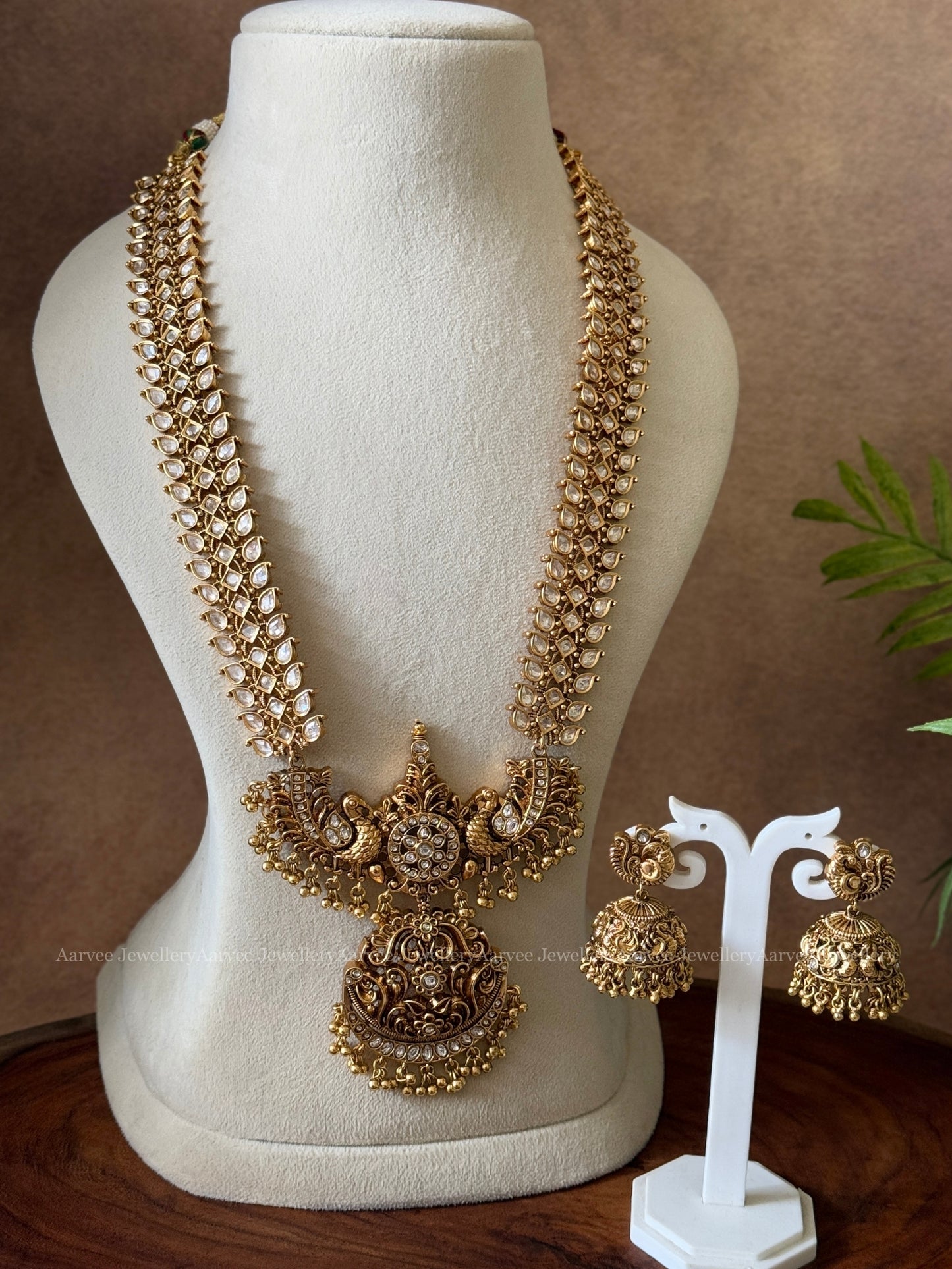 KUNDAN WHITE STONES HARAM SET WITH PEACOCK PENDANT & GOLD BEADS