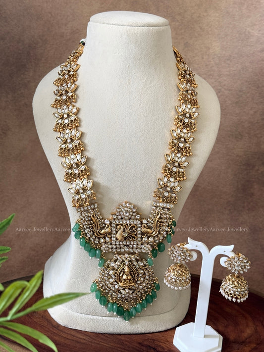 KUNDAN WHITE STONES LOTUS MOTIF HARAM SET WITH LAKSHMI PENDANT AND PASTEL BEADS