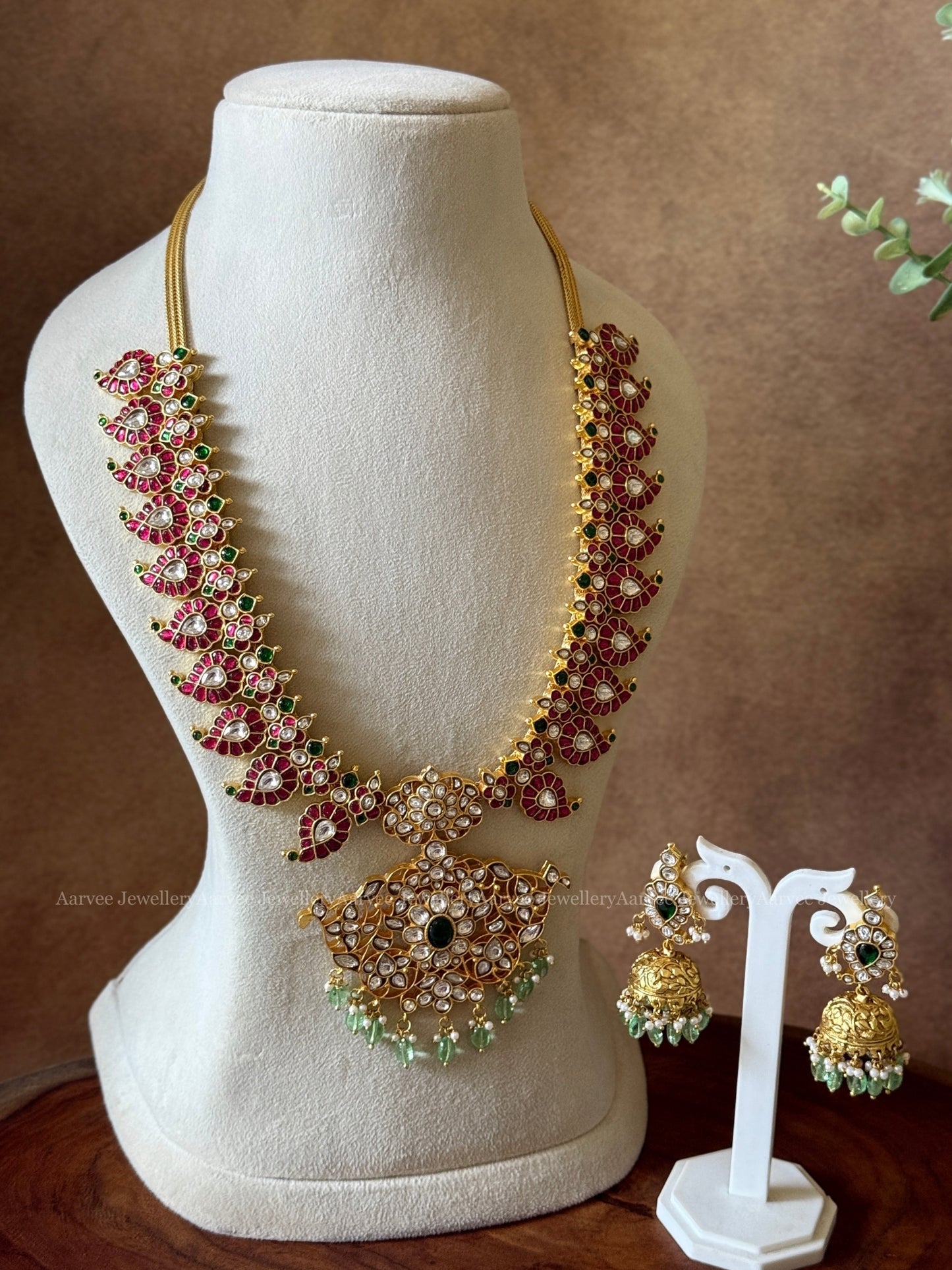 JADAU KUNDAN RUBY STONE MANGO MOTIF MID LENGTH HARAM SET WITH WHITE STONE PENDANT & PASTAL BEADS