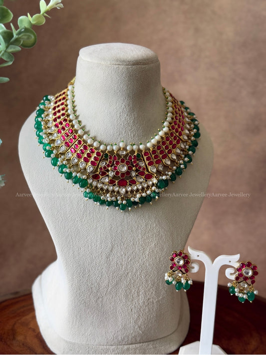 JADAU KUNDAN RUBY STONE NECKLACE SET WITH PEACOCK PENDANT IN GREEN BEADS