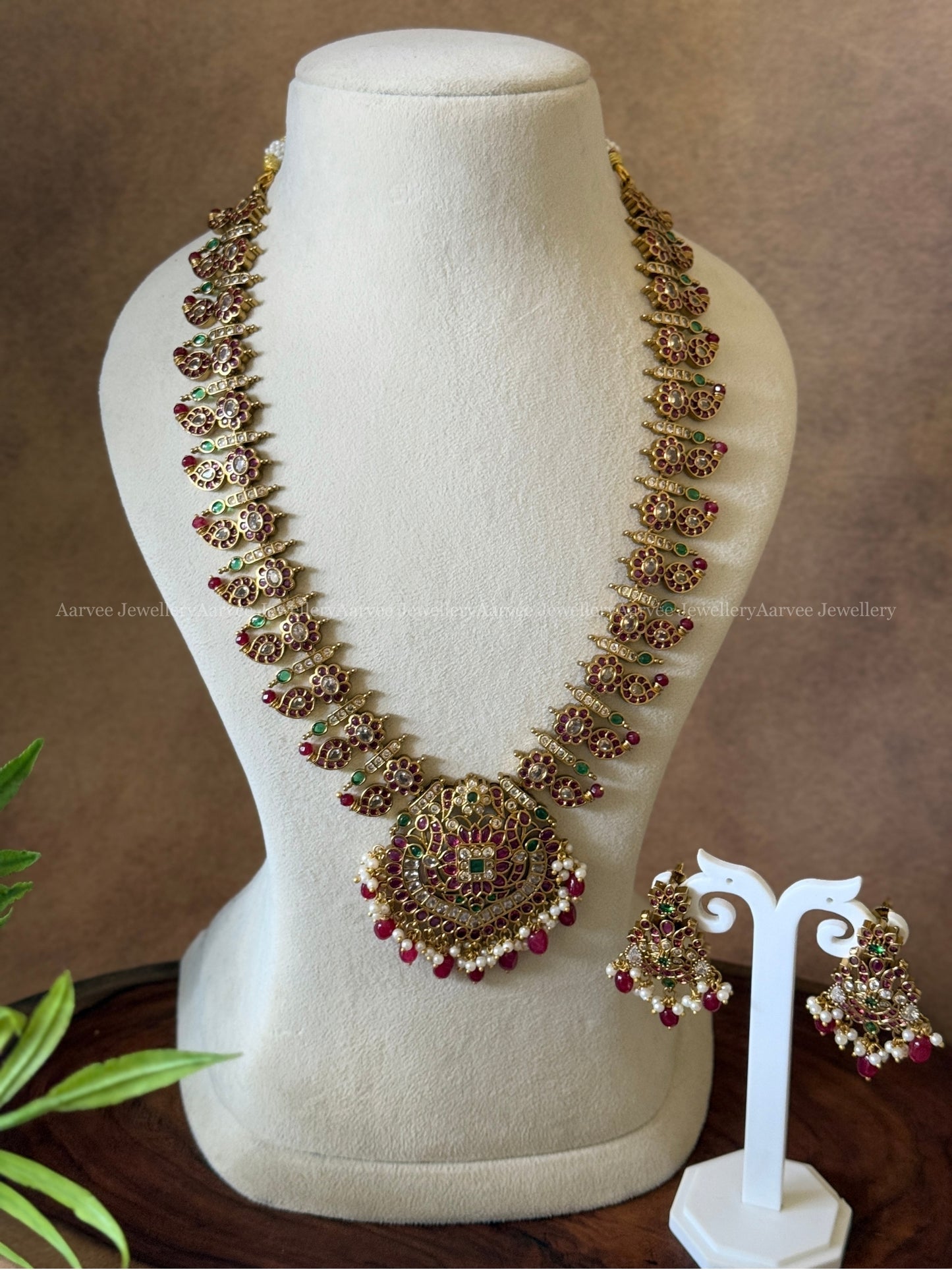 KEMP STONE MANGO MID LENGTH HARAM SET WITH RUBY BEADS