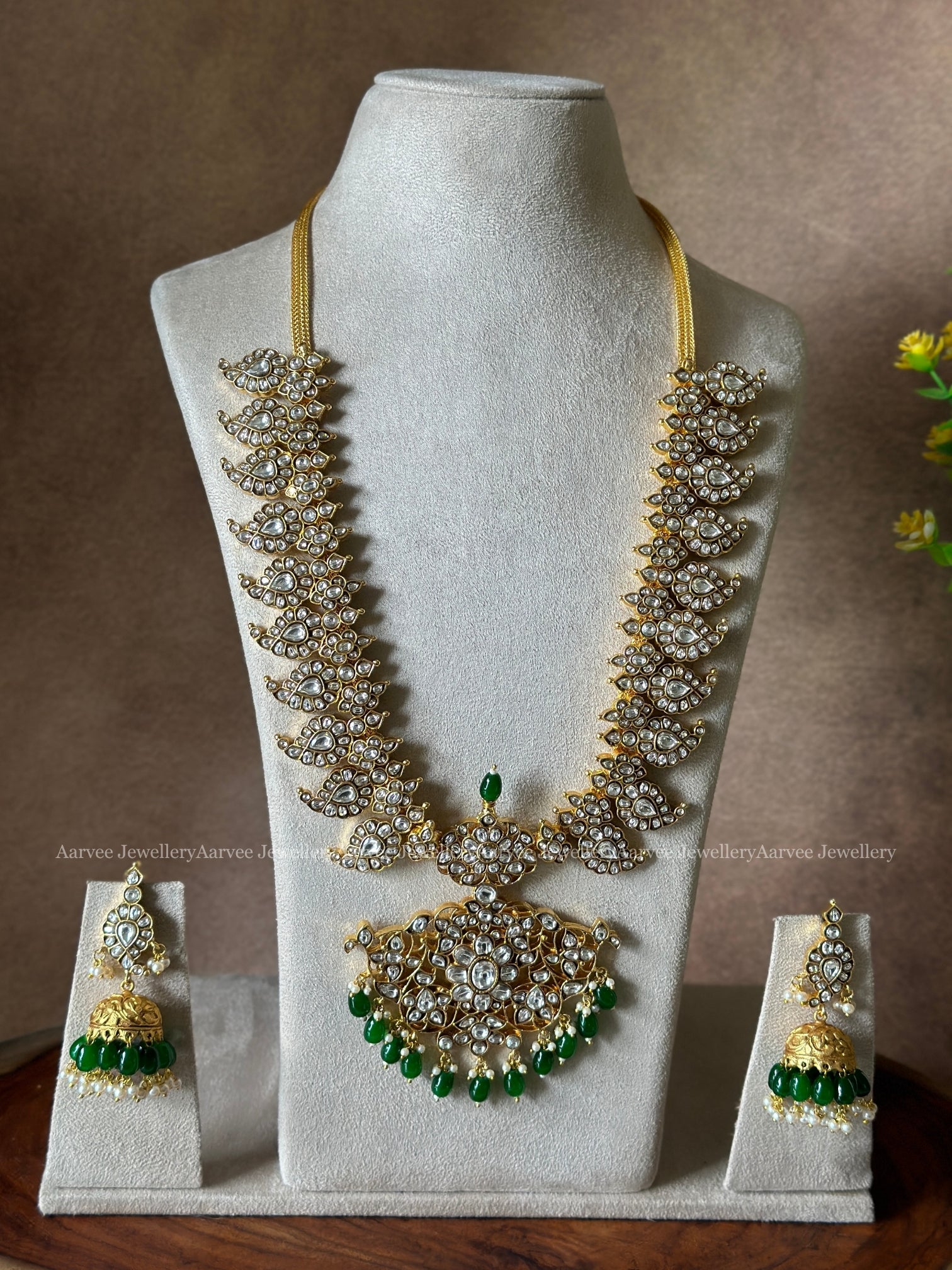 JADAU KUNDAN MANGO MOTIF MID LENGTH HARAM SET WITH WHITE STONES GREEN BEADS