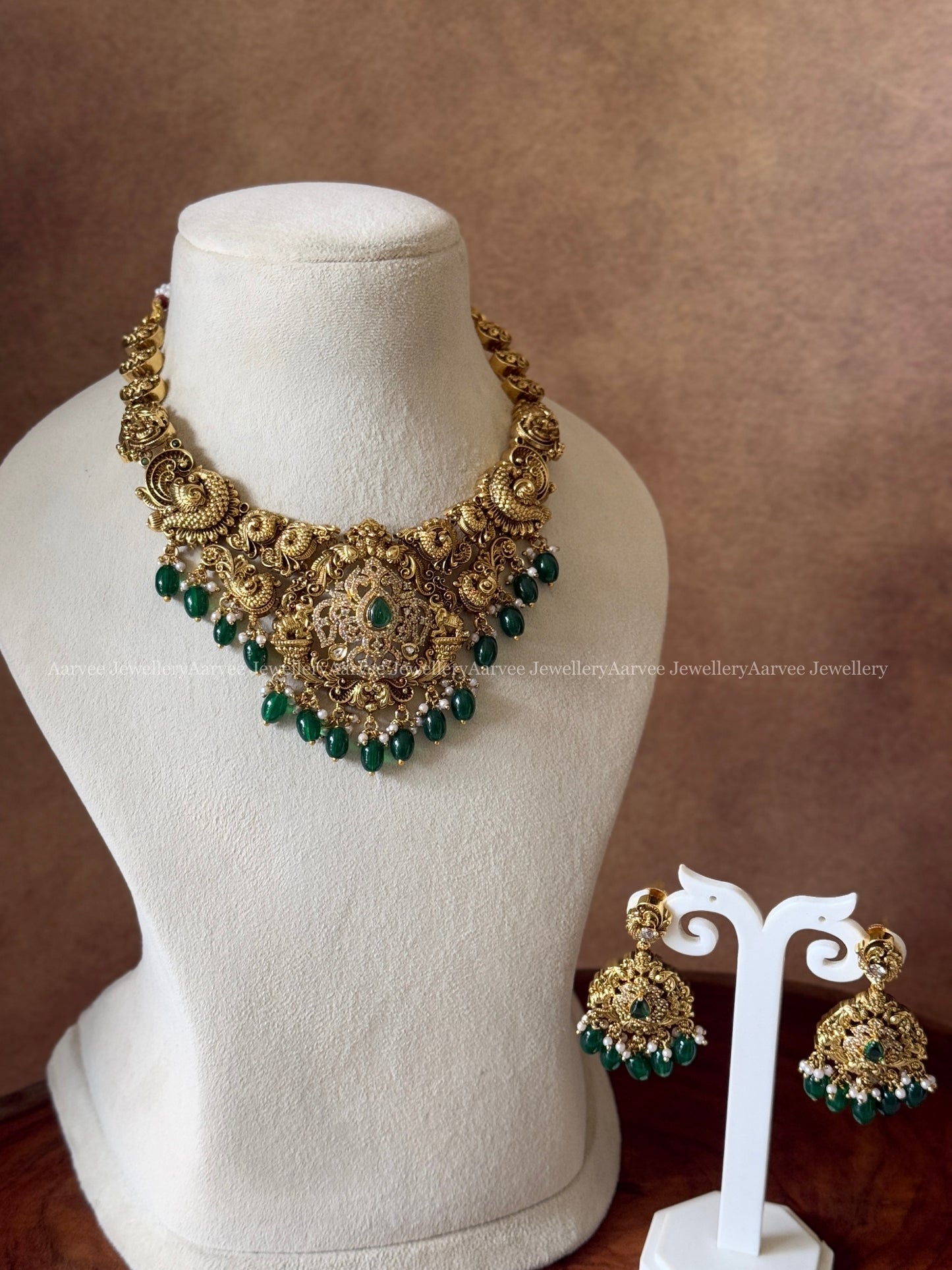 GOLD FINISH NON IDOL NECKLACE SET WITH GREEN BEADS