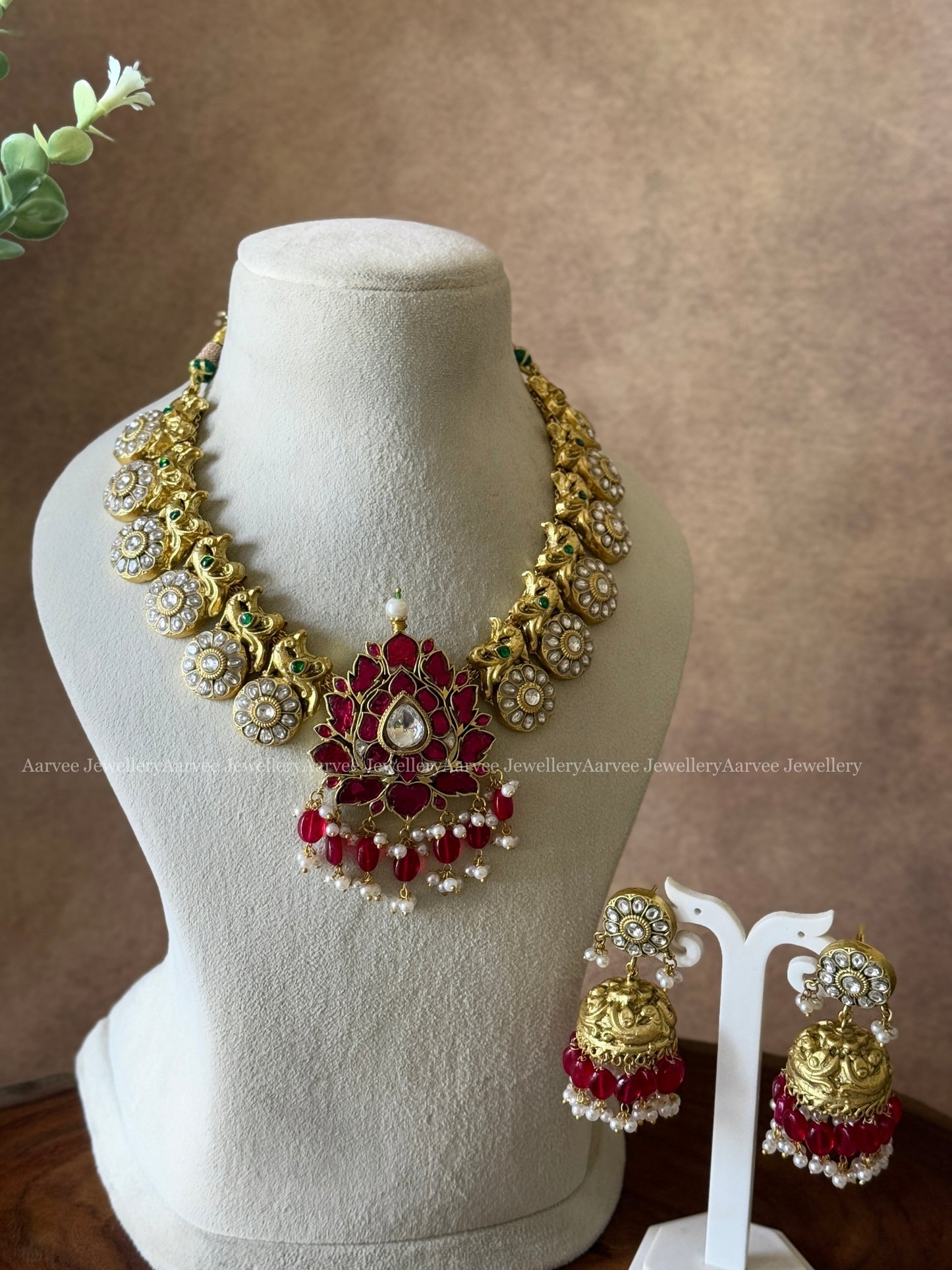JADAU KUNDAN WHITE STONE BUTTA NECKLACE SET WITH RUBY LOTUS PENDANT AND RUBY BEADS