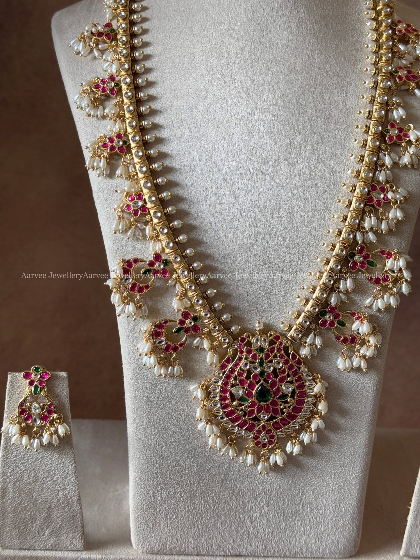 SEMI PRECIOUS KEMP STONES GUTTA PUSALU HARAM SET WITH PEACOCK PENDANT & RICE PEARLS | GOLD FINISH