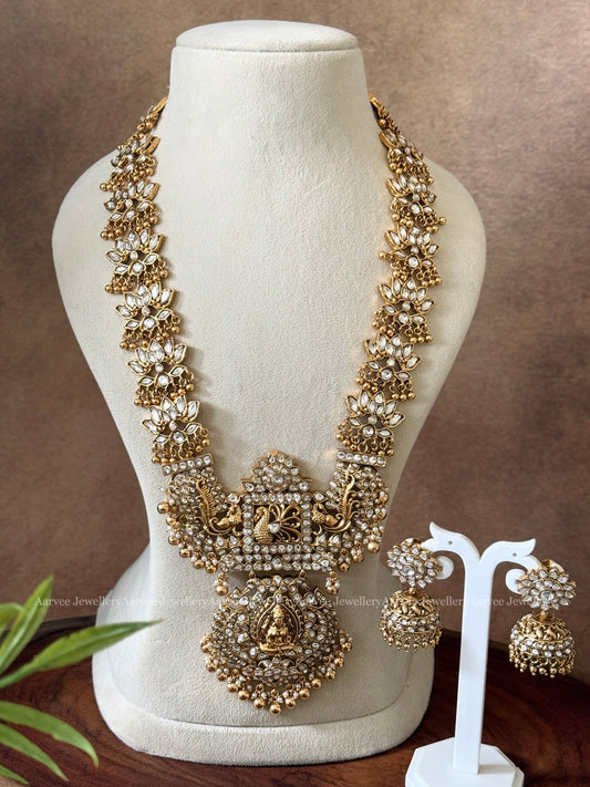 KUNDAN WHITE STONES LOTUS MOTIF HARAM SET WITH LAKSHMI PENDANT WITH GOLD BEADS
