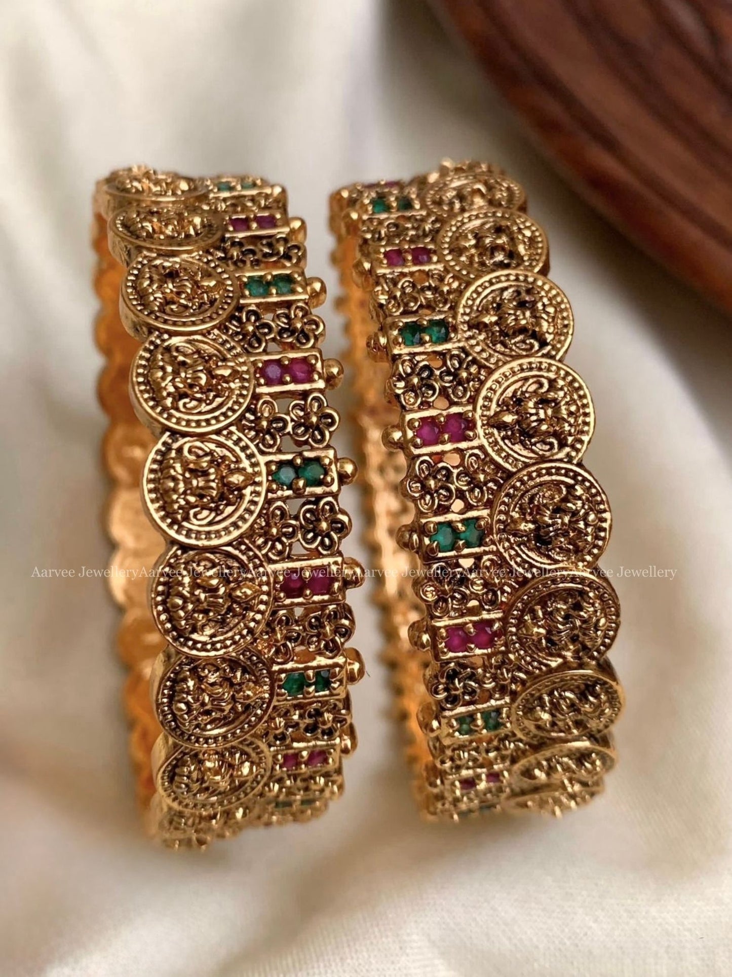 GOLD FINISH LAKSHMI COIN BANGLES WITH RUBY & GREEN STONES
