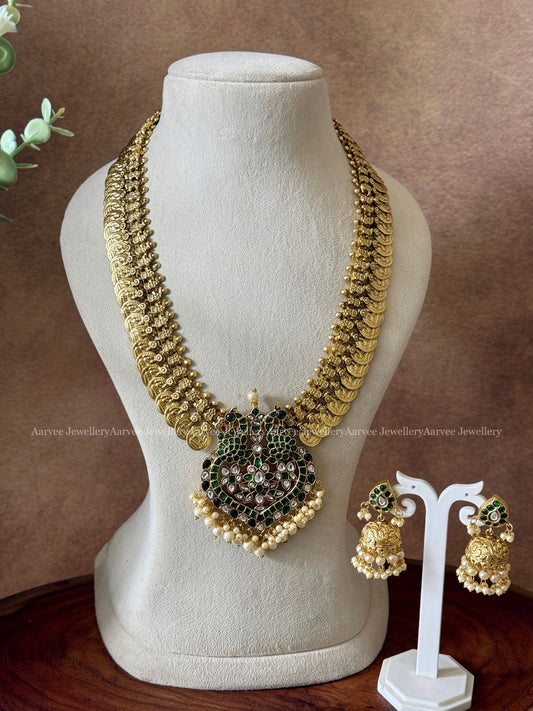 COIN MIDLENGTH CHAIN WITH JADAU KUNDAN GREEN STONE PEACOCK PENDANT & JHUMKI IN PEARL BEADS