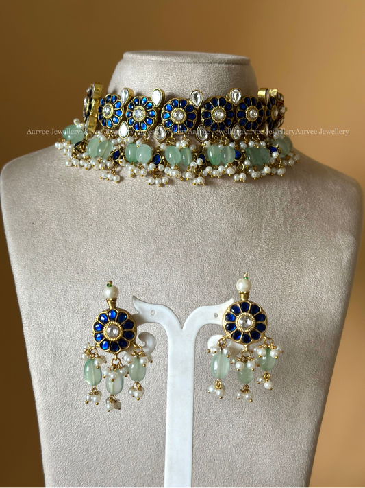 JADAU KUNDAN BLUE STONE BUTTA CHOKER SET WITH PASTEL BEADS