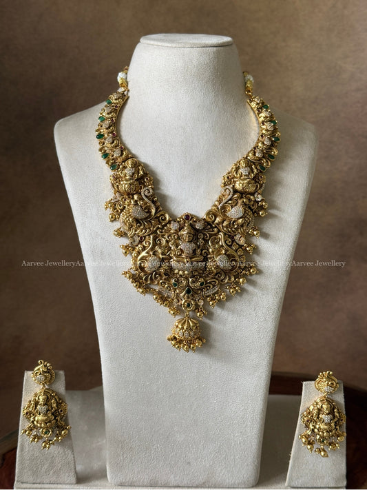 GOLD FINISH BROAD KANTI NECKLACE SET WITH LAKSHMI PENDANT