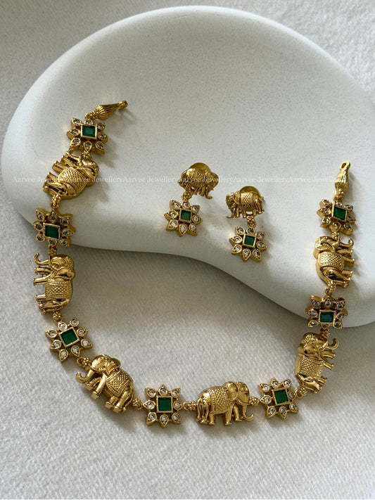 MINIMAL ELEPHANT & FLORAL NECKLACE SET IN CZ GREEN STONE