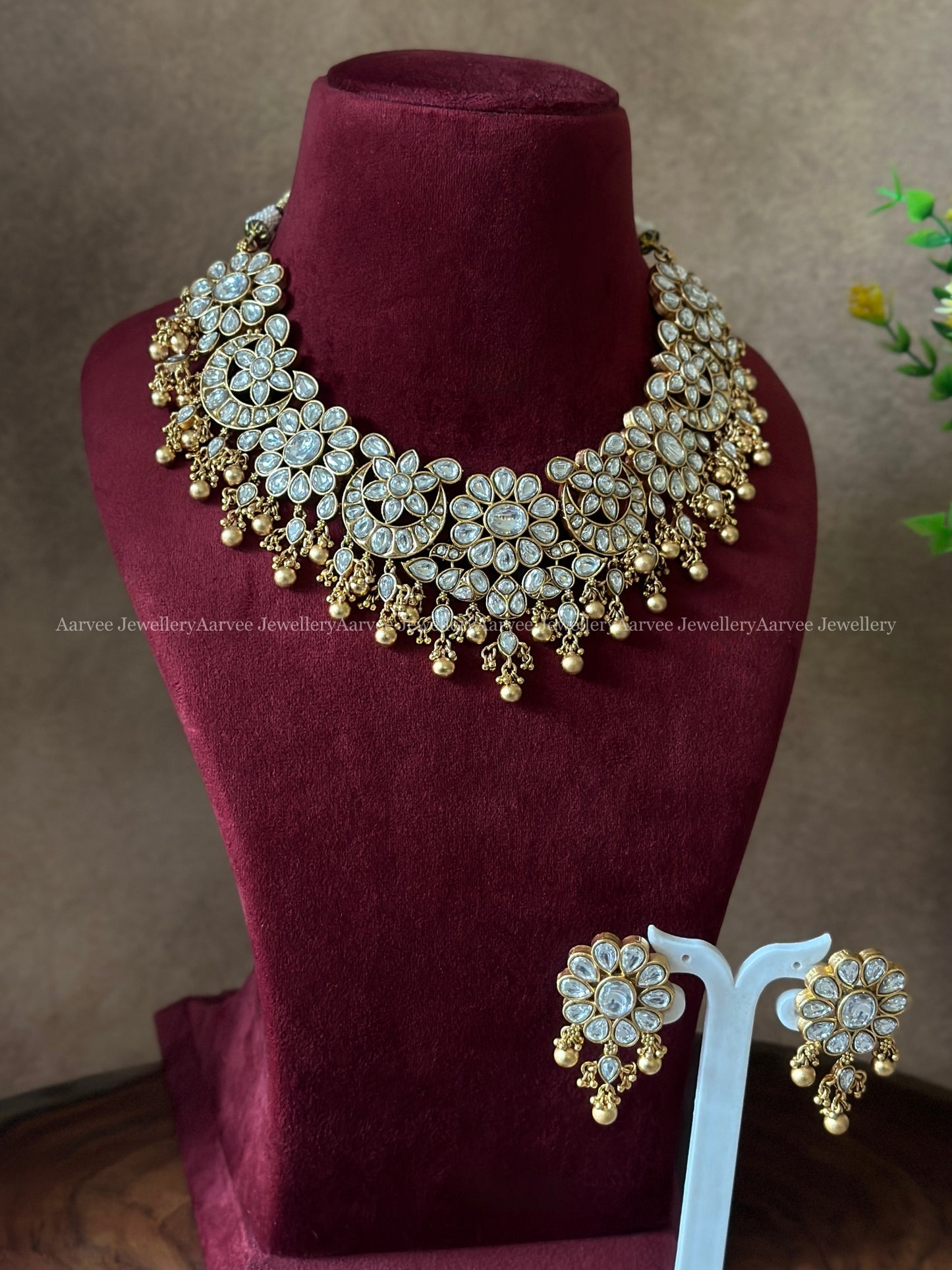 FLORAL NECKLACE SET WITH KUNDAN STONES AND GOLD BEADS