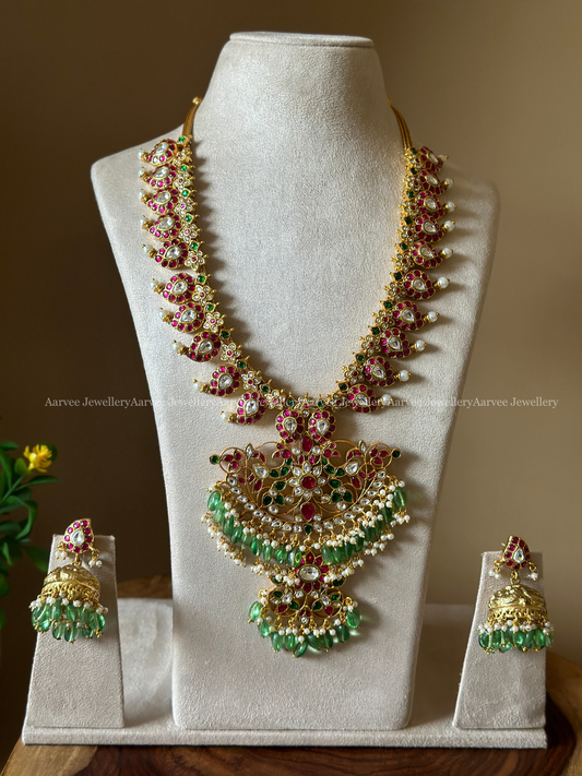 JADAU KUNDAN MANGO HARAM WITH LAYERED PENDANT AND JHUMKI IN PASTEL GREEN BEADS