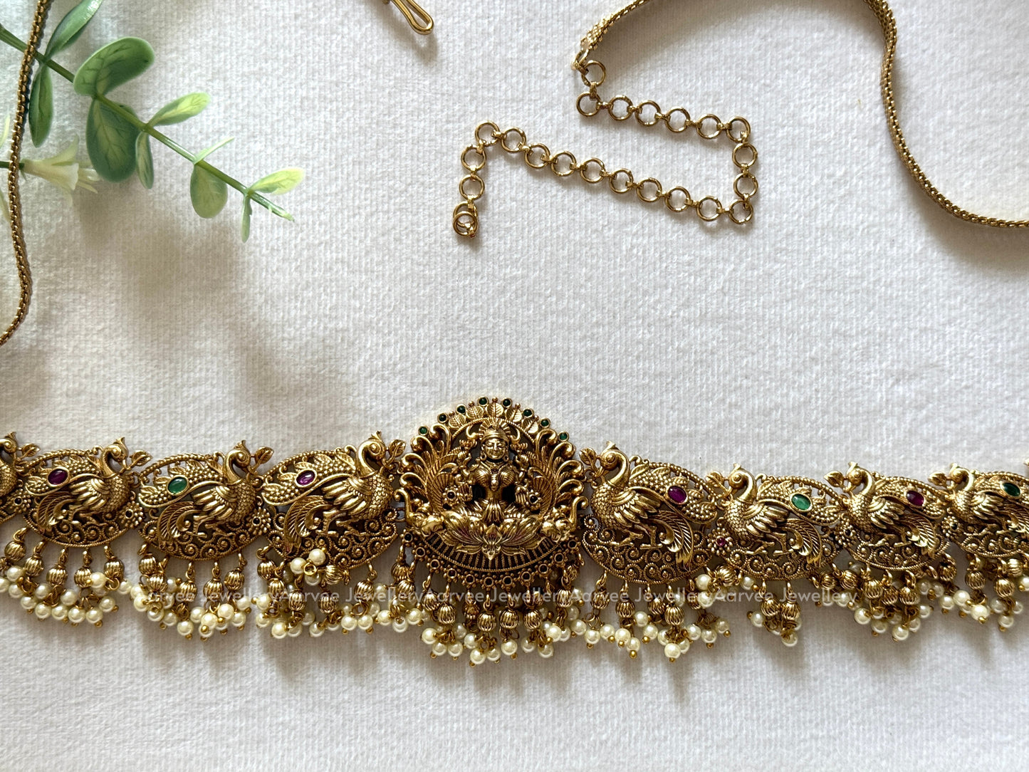 GOLD FINISH LAKSHMI & PEACOCK MOTIF WAIST CHAIN WITH MIX OF GOLD & PEARL BEADS