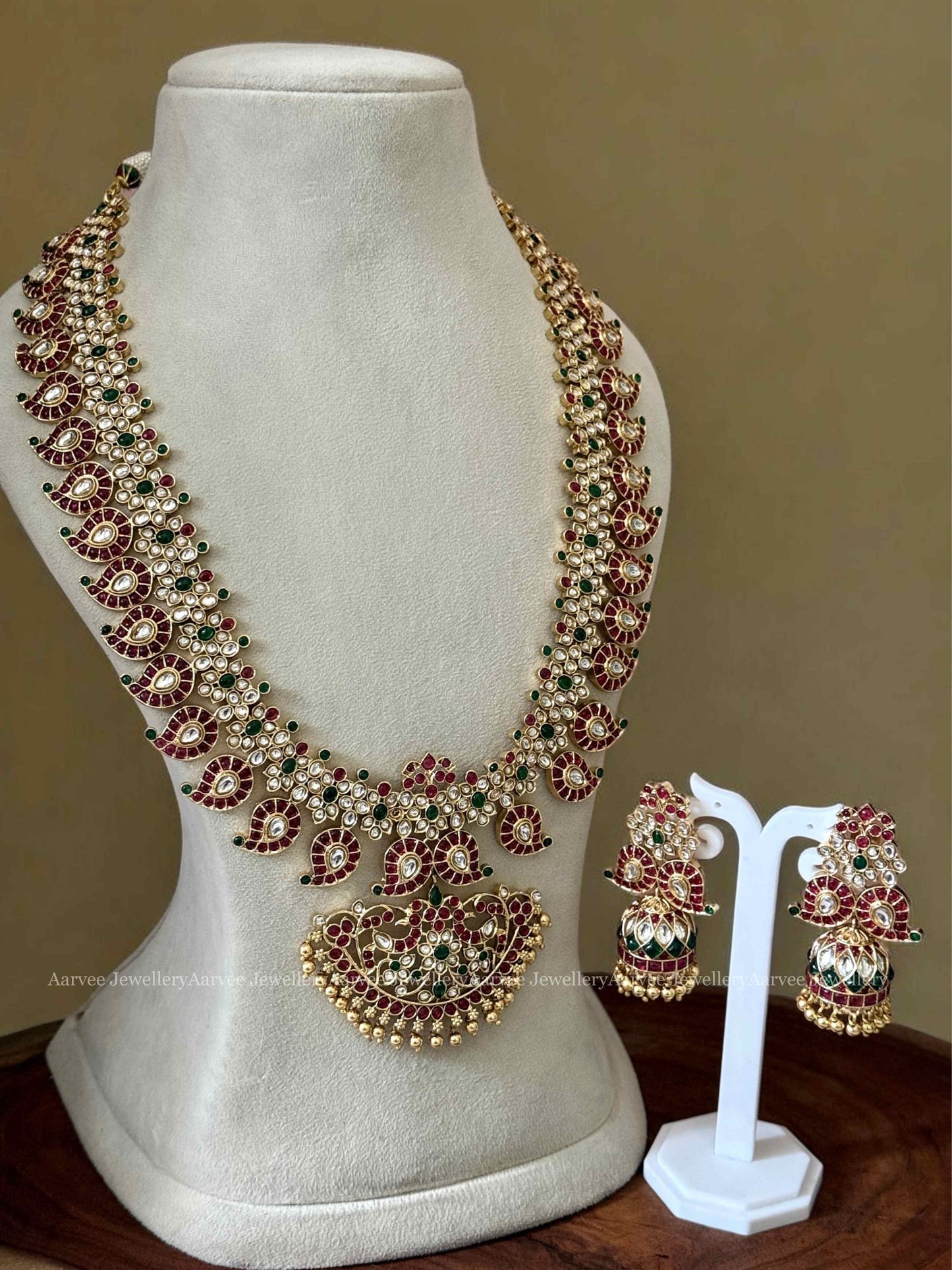A CLASSIC MANGO MOTIF HARAM SET WITH KEMP RUBY / GREEN / WHITE STONES