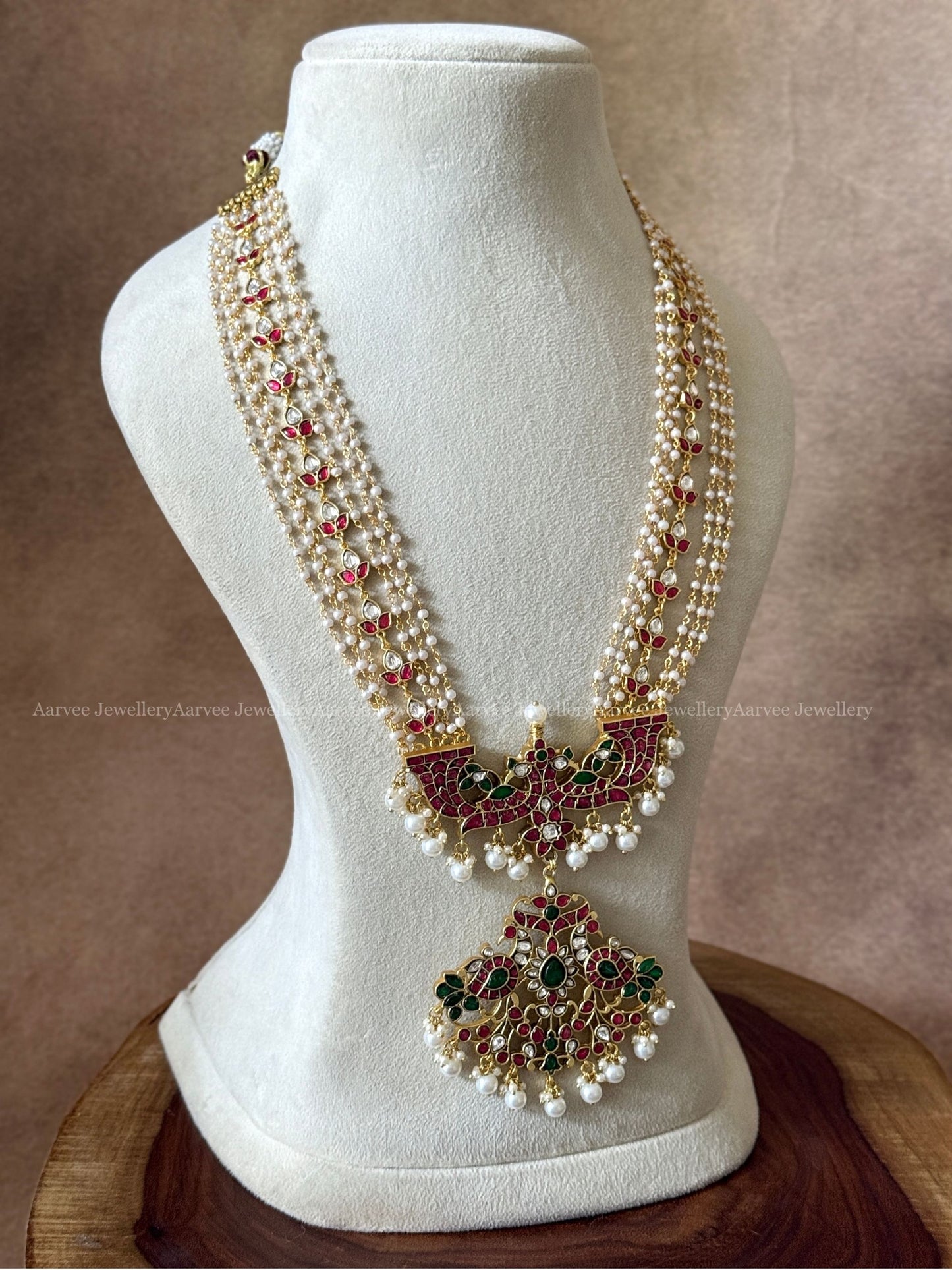 JADAU KUNDAN PEARL BEADED LAYERED MID LENGTH HARAM WITH PEACOCK PENDANT