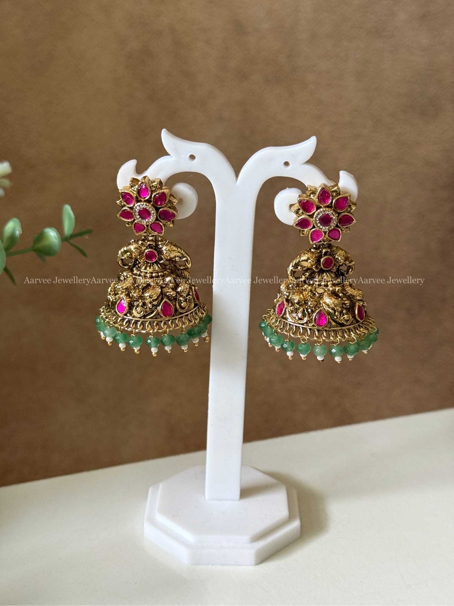 PREMIUM KUNDAN STONES FLORAL JHUMKI WITH PASTEL BEADS