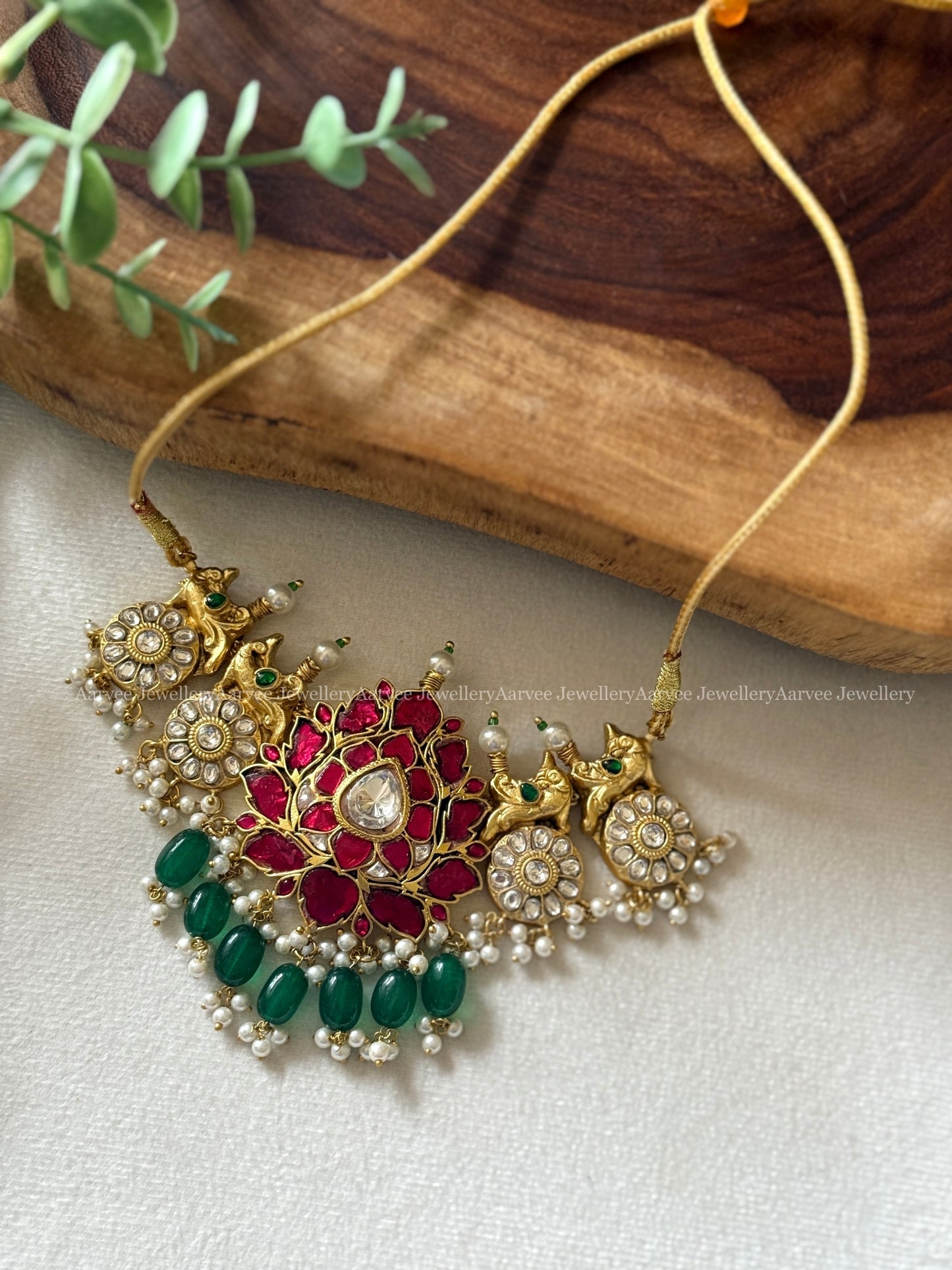 JADAU KUNDAN RUBY STONE LOTUS CHOKER SET WITH GREEN BEADS