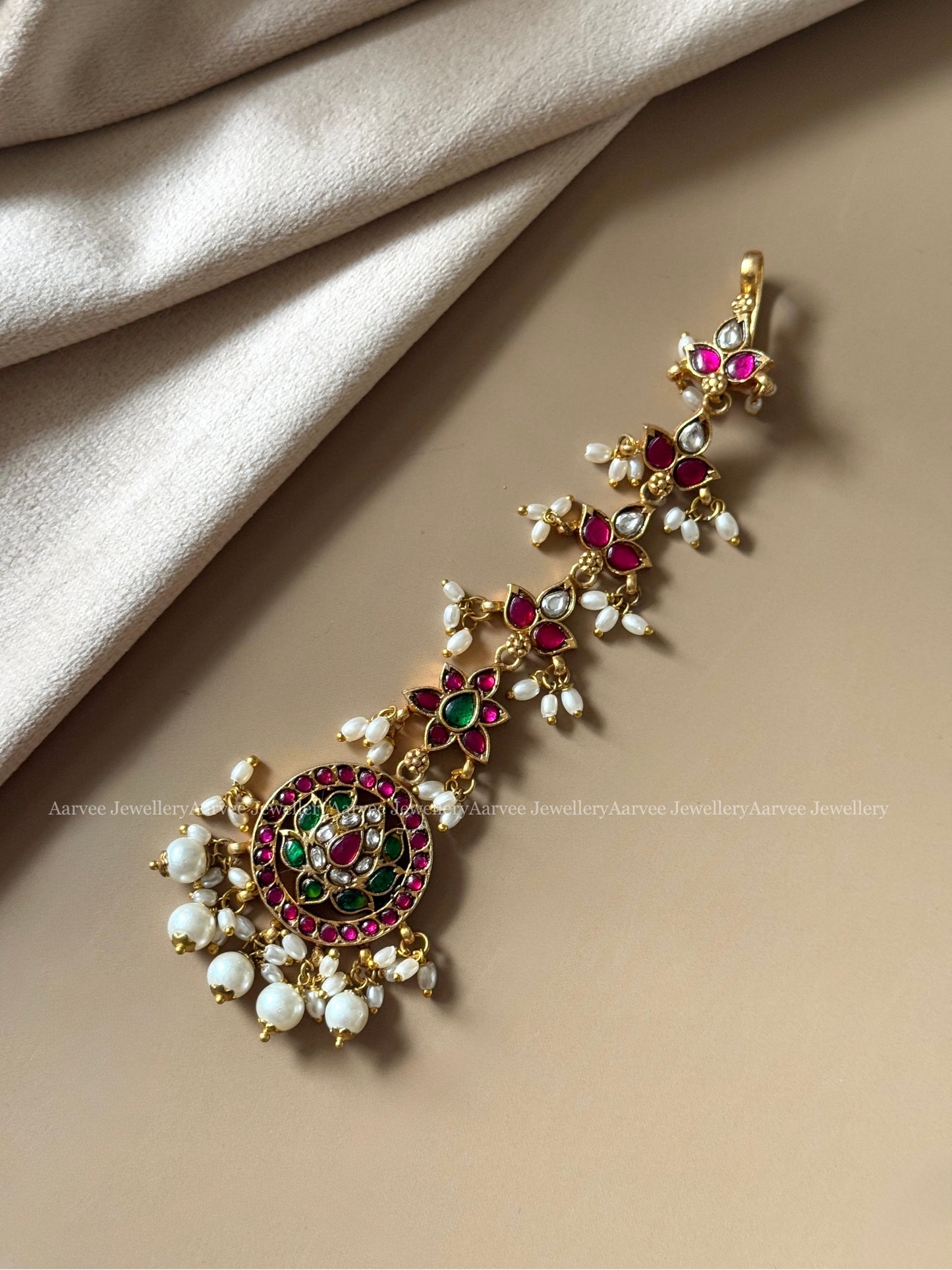 JADAU KUNDAN LOTUS TIKKA WITH PEARLS