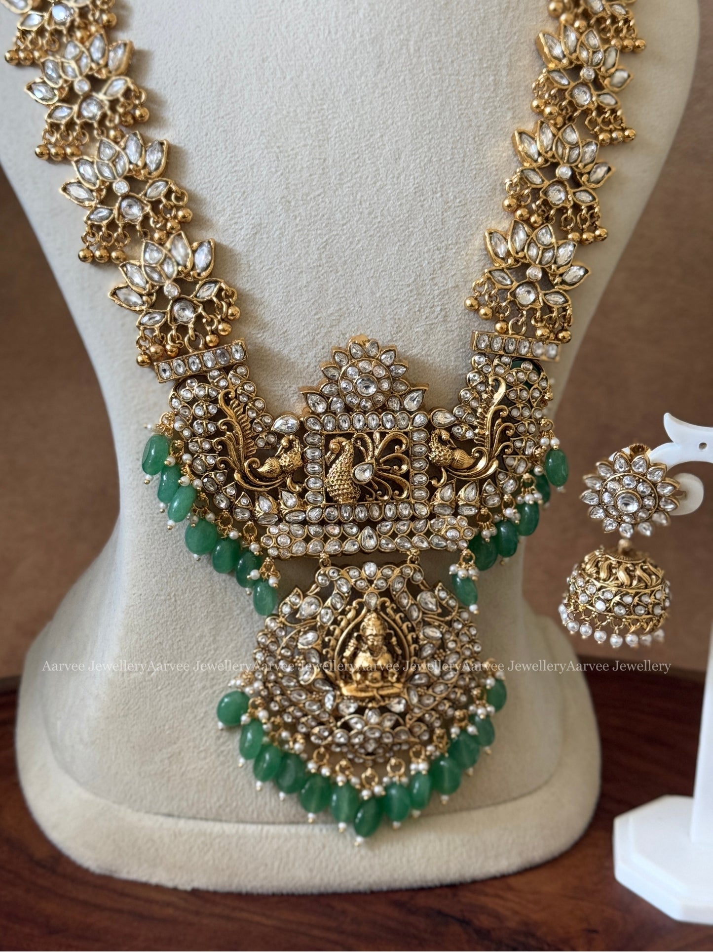 KUNDAN WHITE STONES HIGH NECK CHOKER | LOTUS MOTIF HARAM WITH LAKSHMI PEACOCK PENDANT WITH PASTEL BEADS