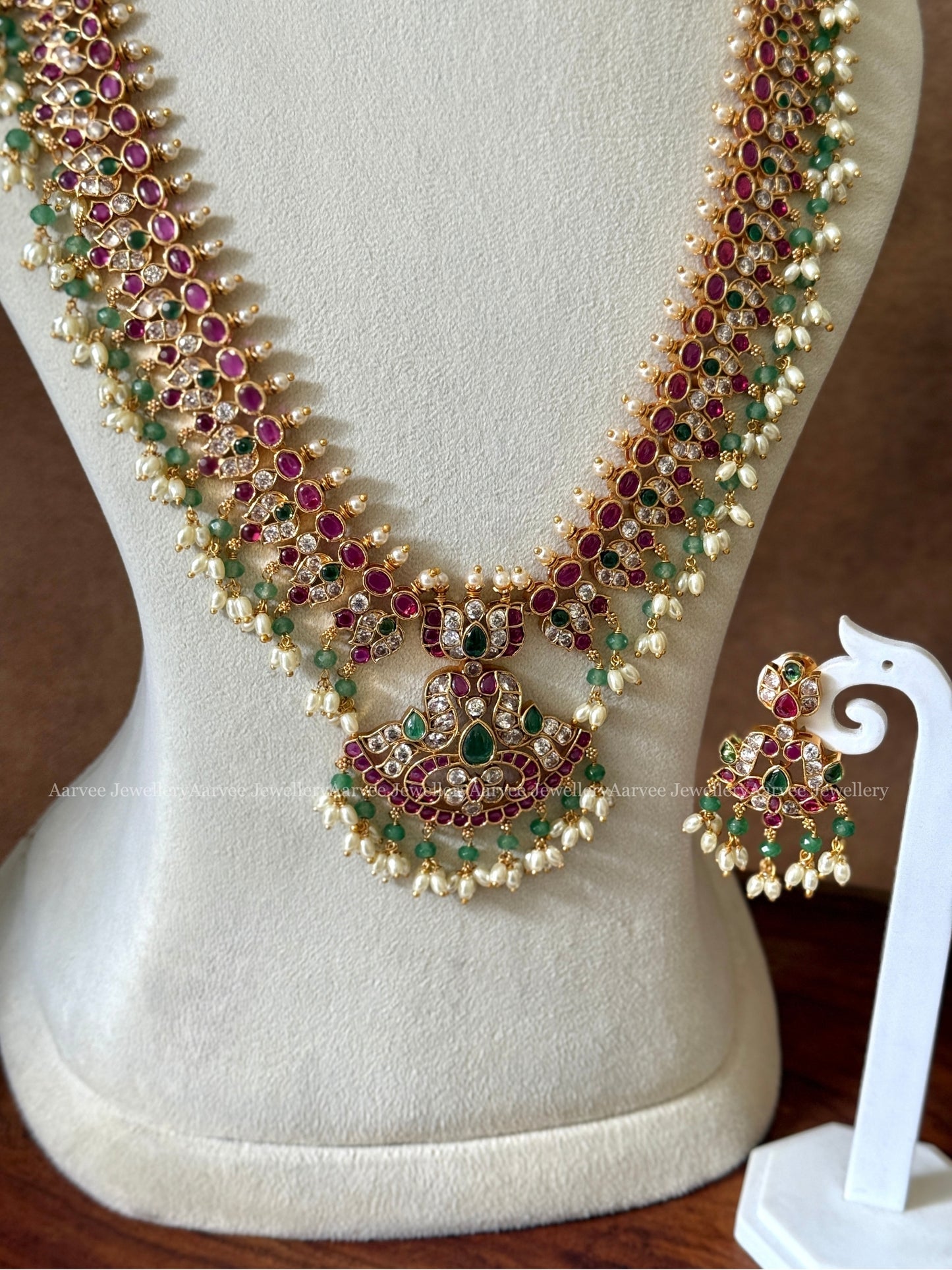 RUBY STONE FLORAL HARAM SET WITH TINY PASTEL GREEN BEADS & RICE PEARL