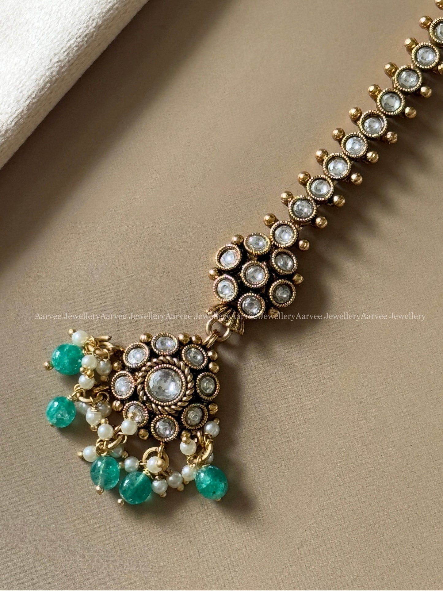WHITE STONE MANGTIKKA WITH PASTEL BEADS