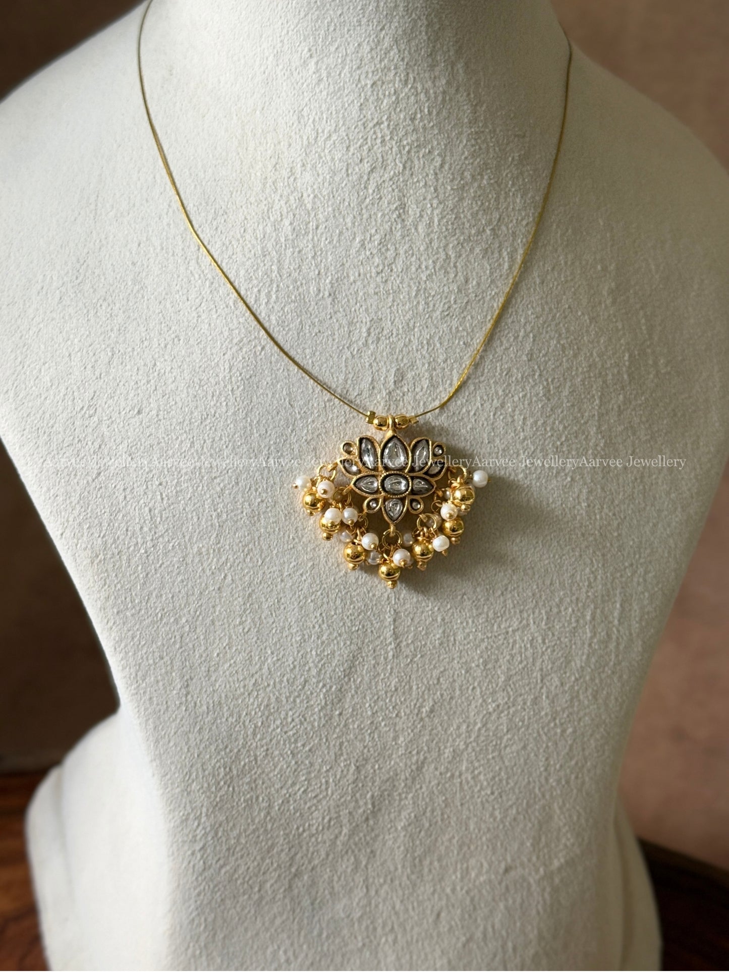 INVISIBLE CHAIN WITH JADAU KUNDAN LOTUS PENDANT AND WITH GOLD & PEARL BEADS
