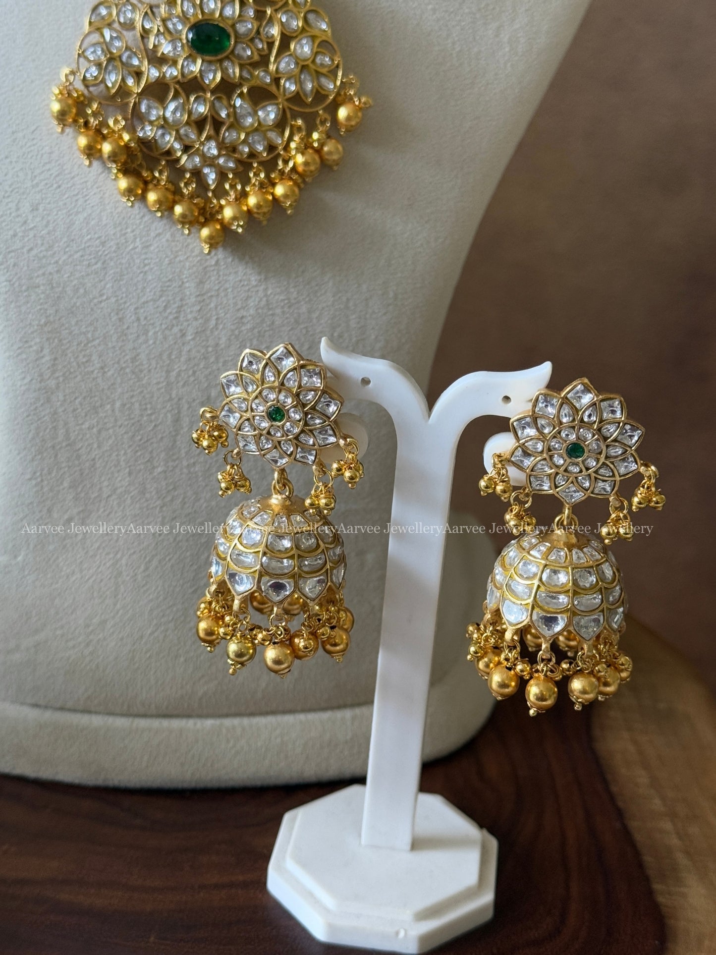 JADAU KUNDAN STATEMENT NECKLACE & FLORAL JHUMKI WITH WHITE STONES & GOLD BEADS