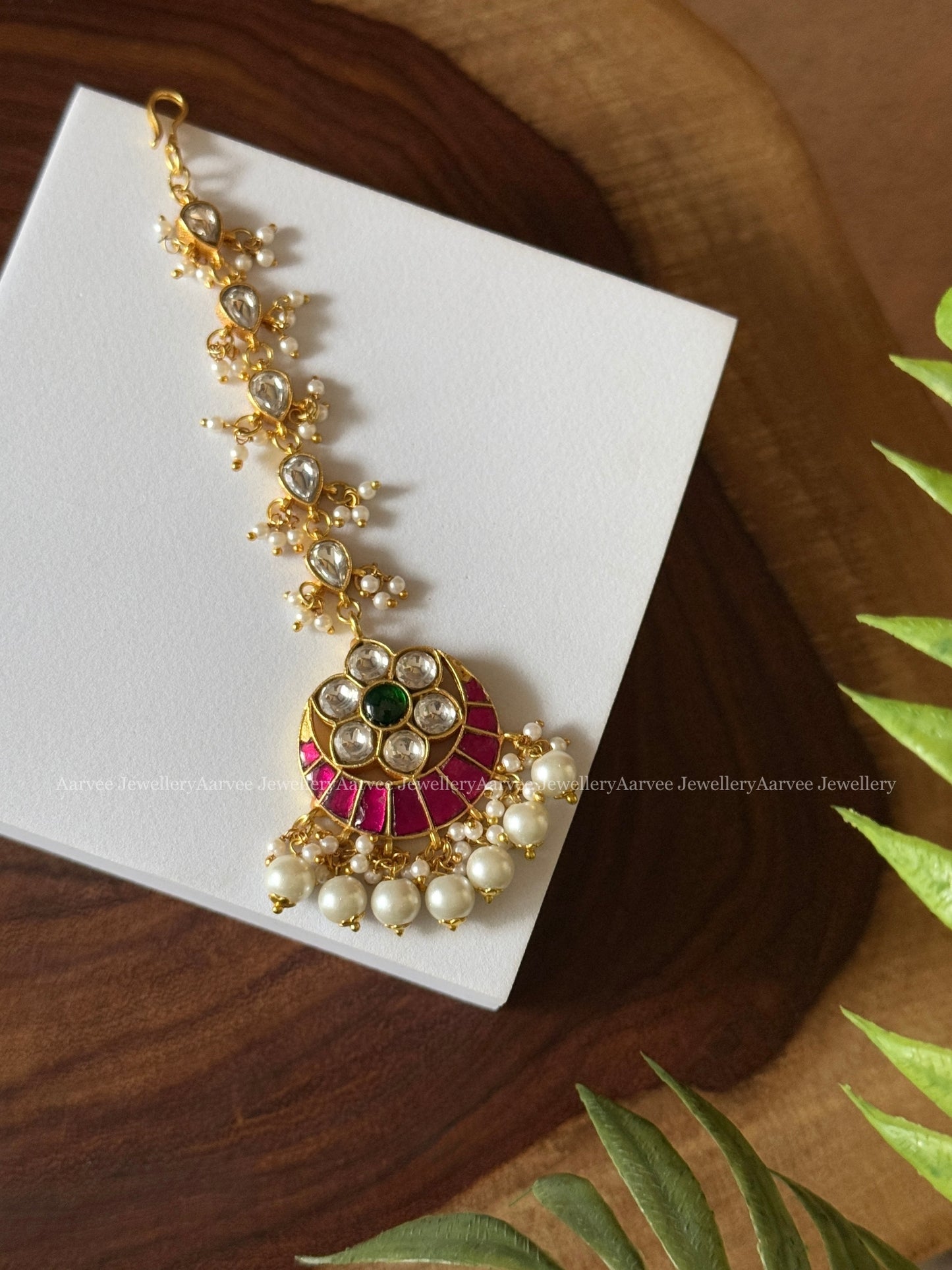 JADAU KUNDAN HALF MOON DESIGN TIKKA WITH RUBY STONES AND PEARLS
