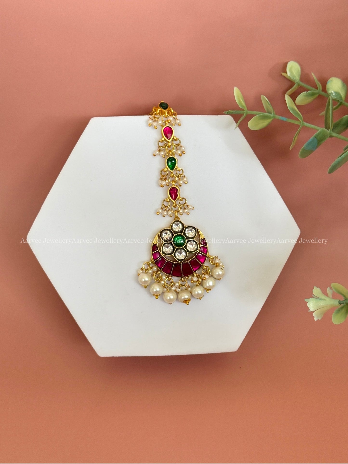 JADAU KUNDAN HALF MOON DESIGN TIKKA WITH PINK / GREEN / WHITE STONES WITH PEARLS