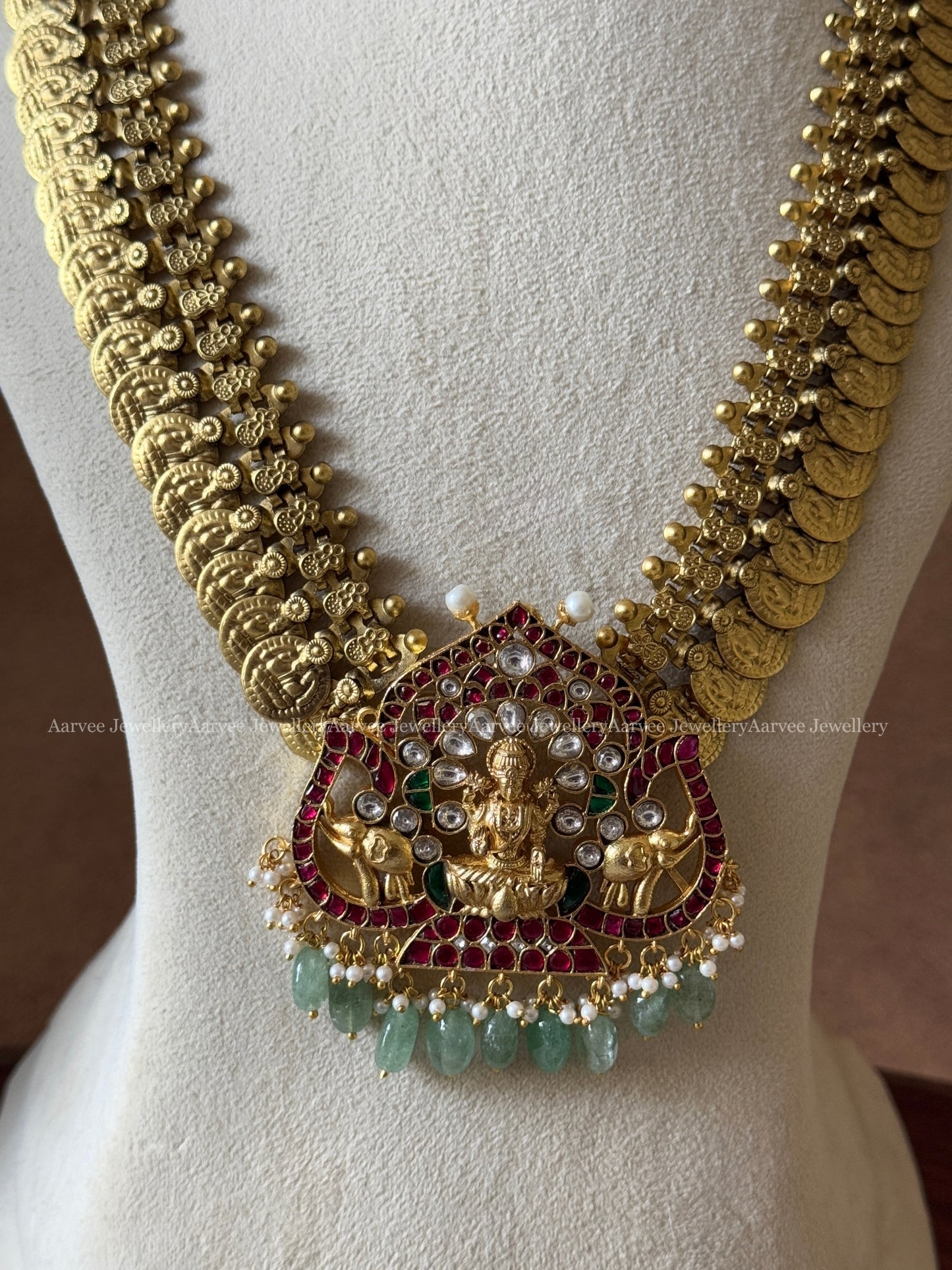 JADAU KUNDAN MID LENGTH GOLD COIN CHAIN WITH LAKSHMI PENDANT WITH PASTEL BEADS