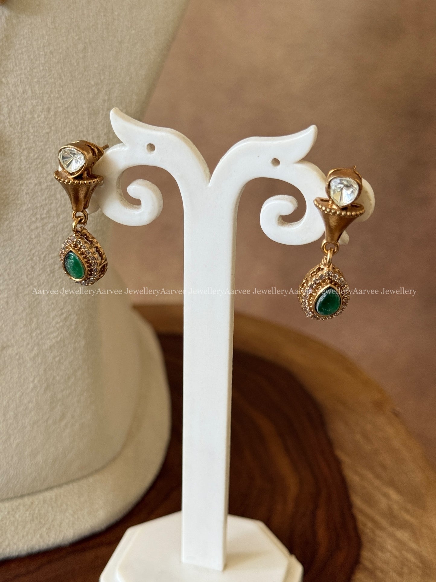 GOLD MID LENGTH CHAIN SET WITH ELEPHANT PENDANT IN GREEN STONES