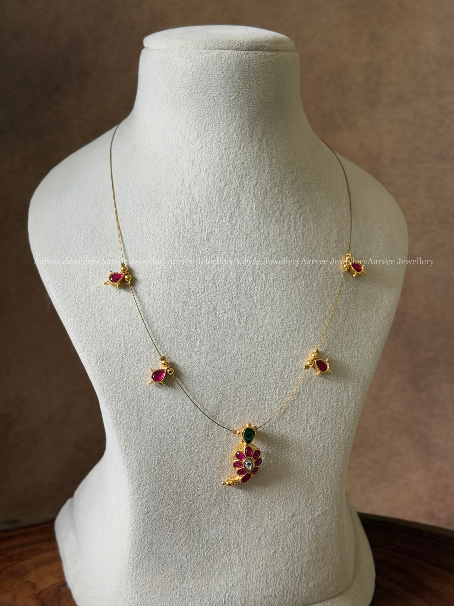 INVISIBLE CHAIN WITH JADAU KUNDAN RUBY STONE MANGO MOTIF PENDANT