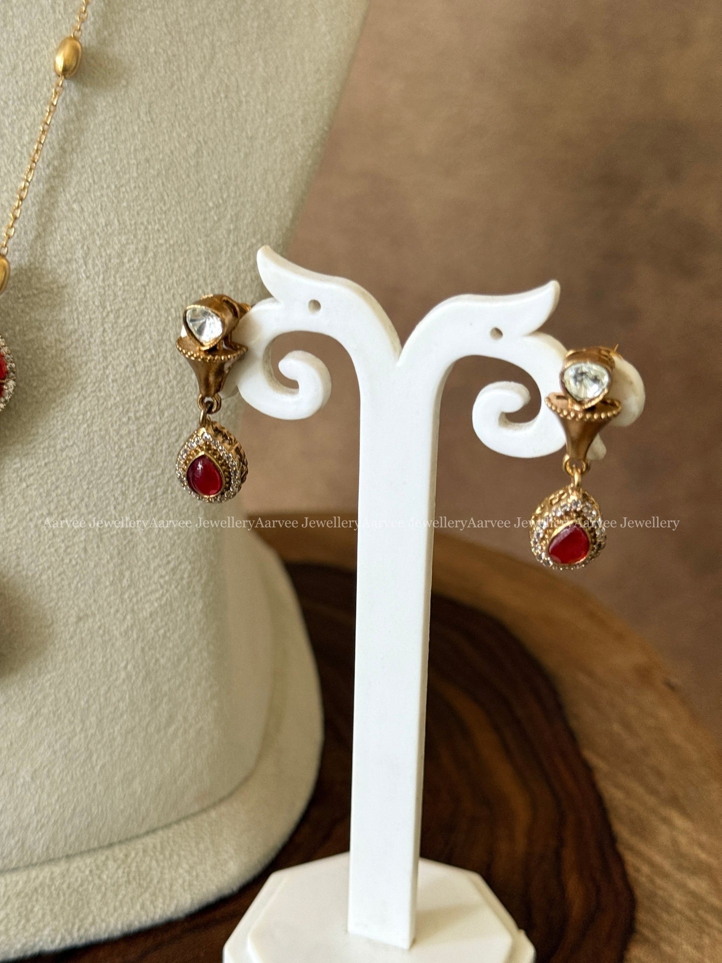 GOLD MID LENGTH CHAIN SET WITH ELEPHANT PENDANT IN RUBY STONES