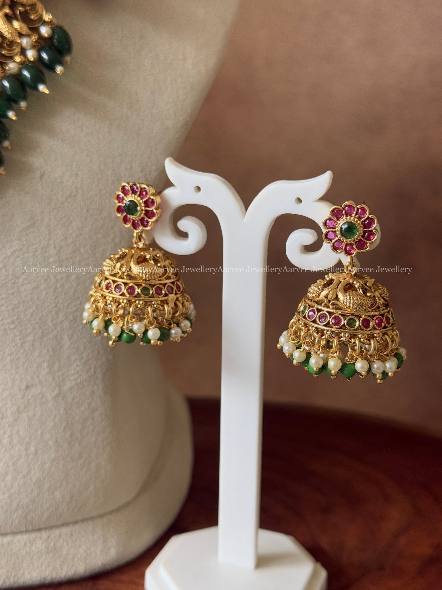 GOLD FINISH LAKSHMI NECKLACE SET WITH GREEN BEADS