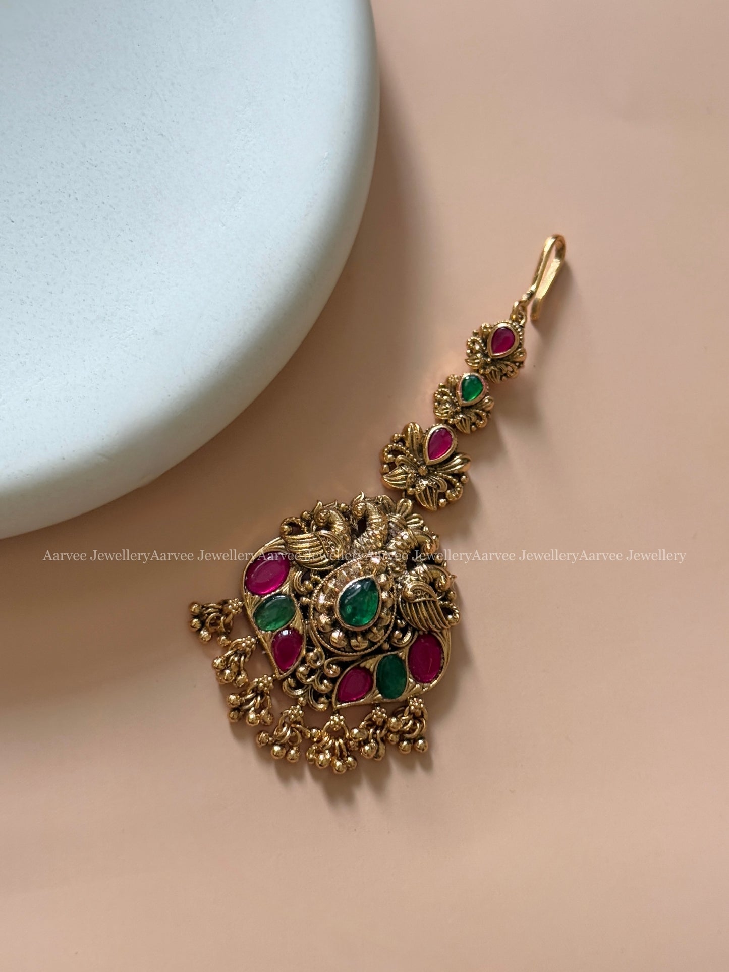 ANTIQUE GOLD FINISH PEACOCK MOTIF KEMP STONE TIKKA WITH GOLD BEADS